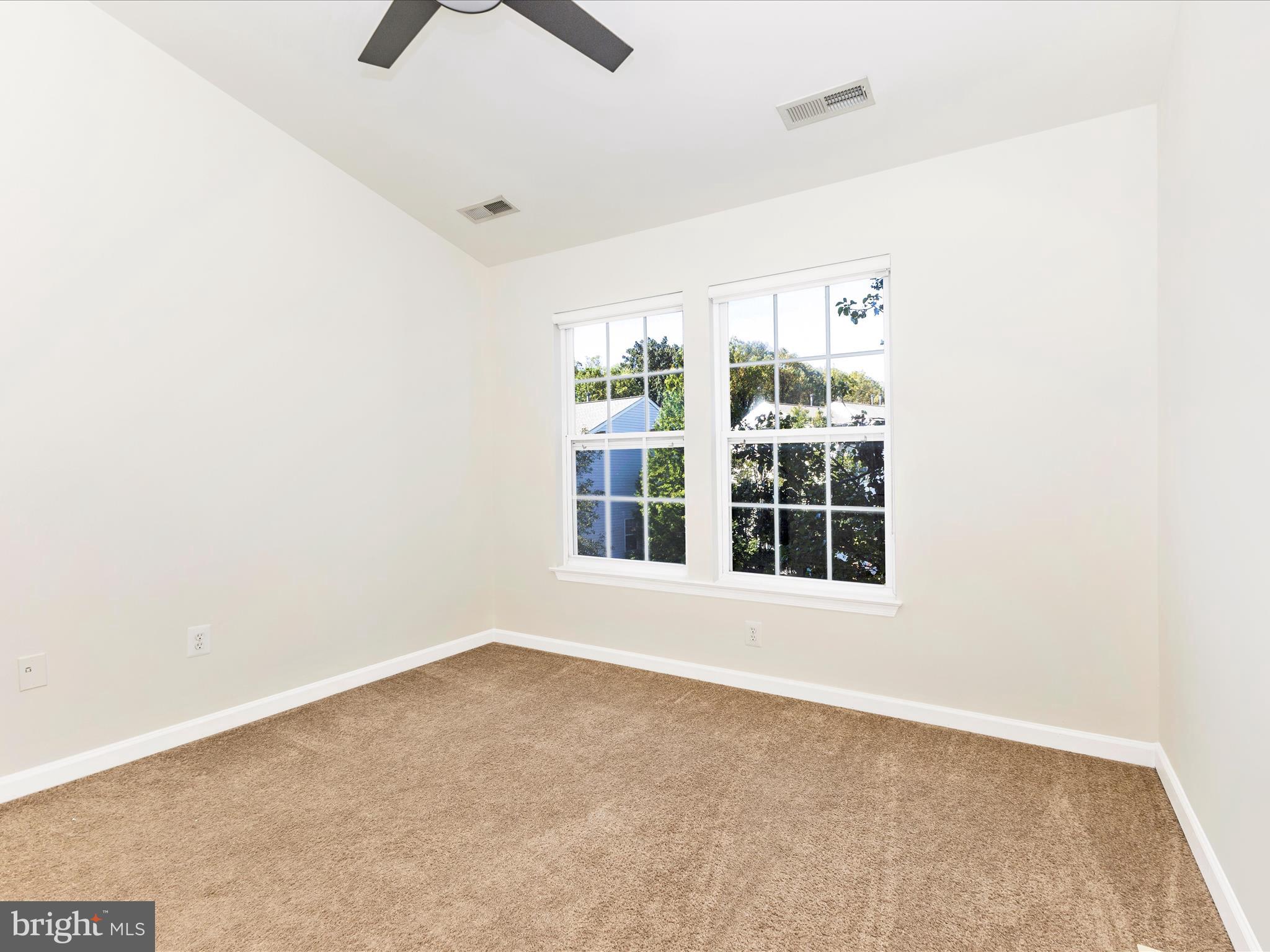 7096 Water Oak Road, Unit 121 Elkridge, MD 21075 - Photo 25 of 46 an empty room with a window
