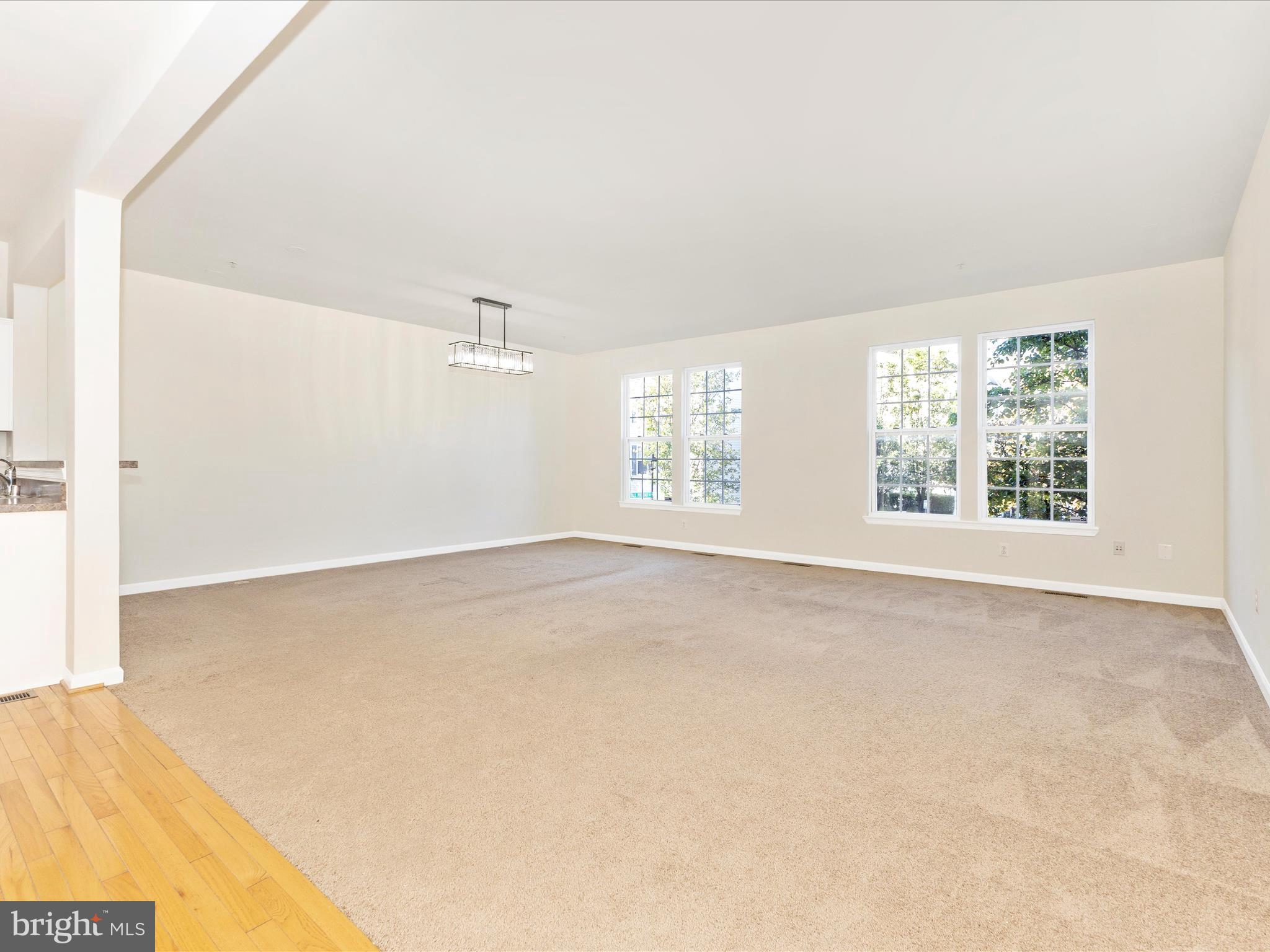 7096 Water Oak Road, Unit 121 Elkridge, MD 21075 - Photo 8 of 46 an empty room with windows