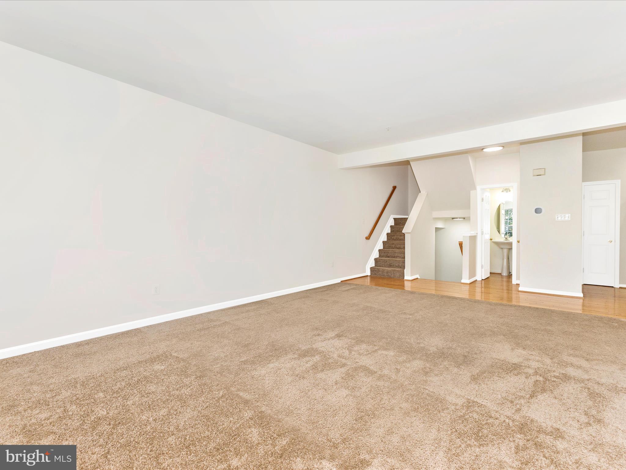 7096 Water Oak Road, Unit 121 Elkridge, MD 21075 - Photo 10 of 46 an empty room with a natural light