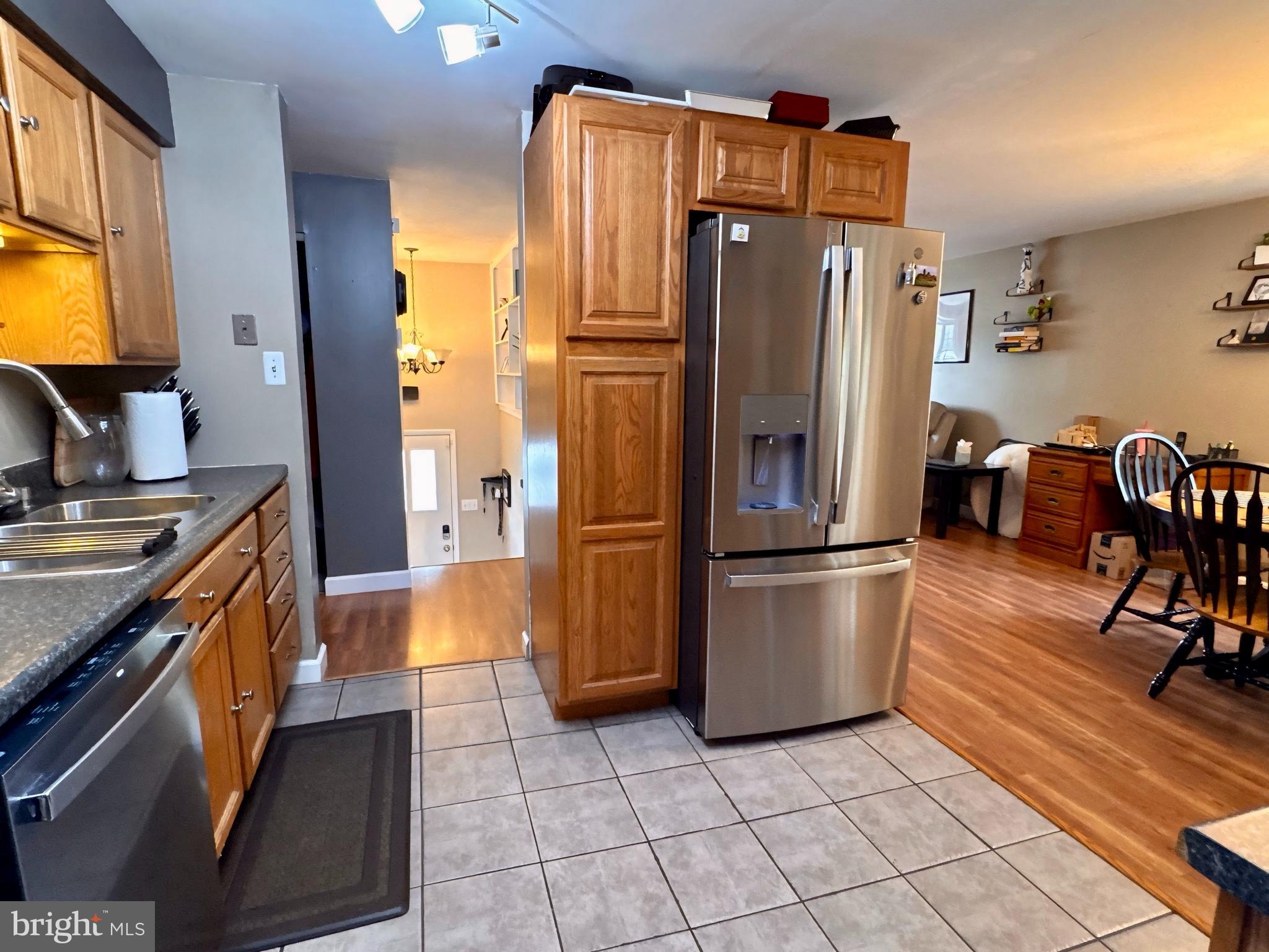 3614 Orchard Court Reading, PA 19606 - Photo 15 of 47 a kitchen with stainless steel appliances a refrigerator and a stove