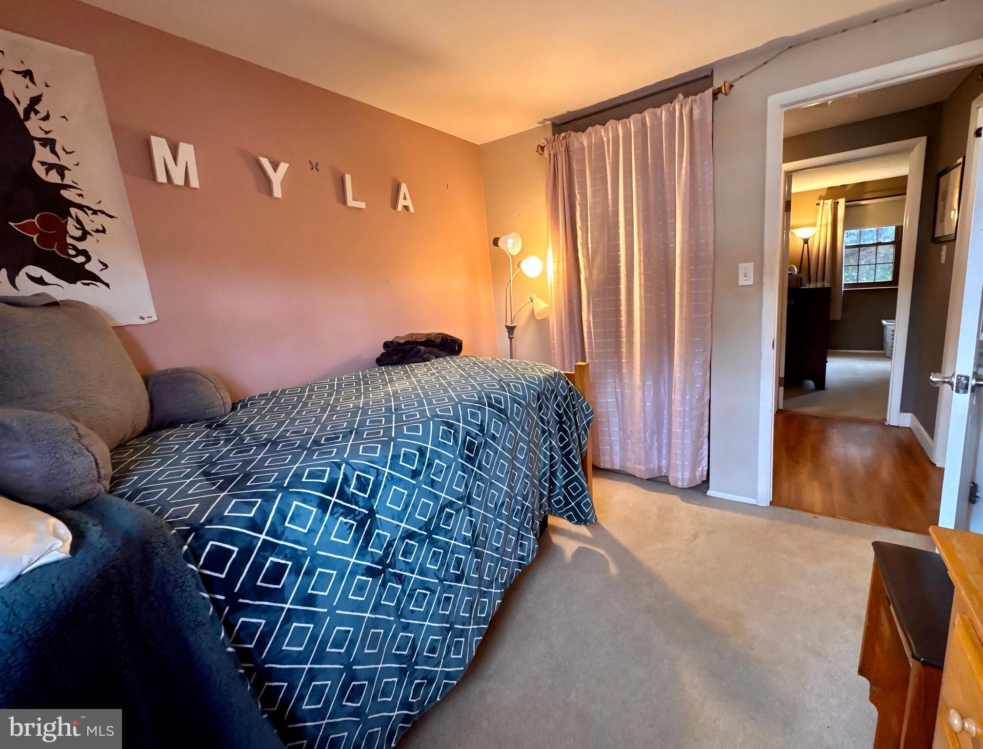 3614 Orchard Court Reading, PA 19606 - Photo 31 of 47 a bedroom with a bed and wooden floor
