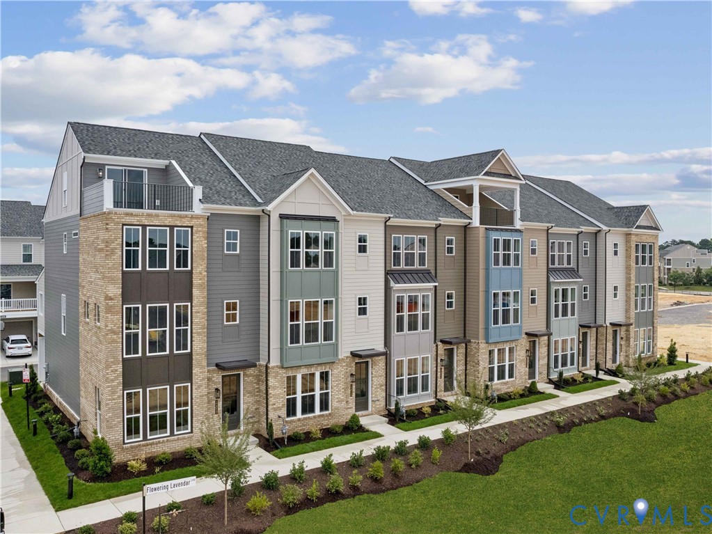 12014 Afternoon Path Henrico, VA 23233 - Photo 26 of 30 a front view of a residential apartment building with a yard