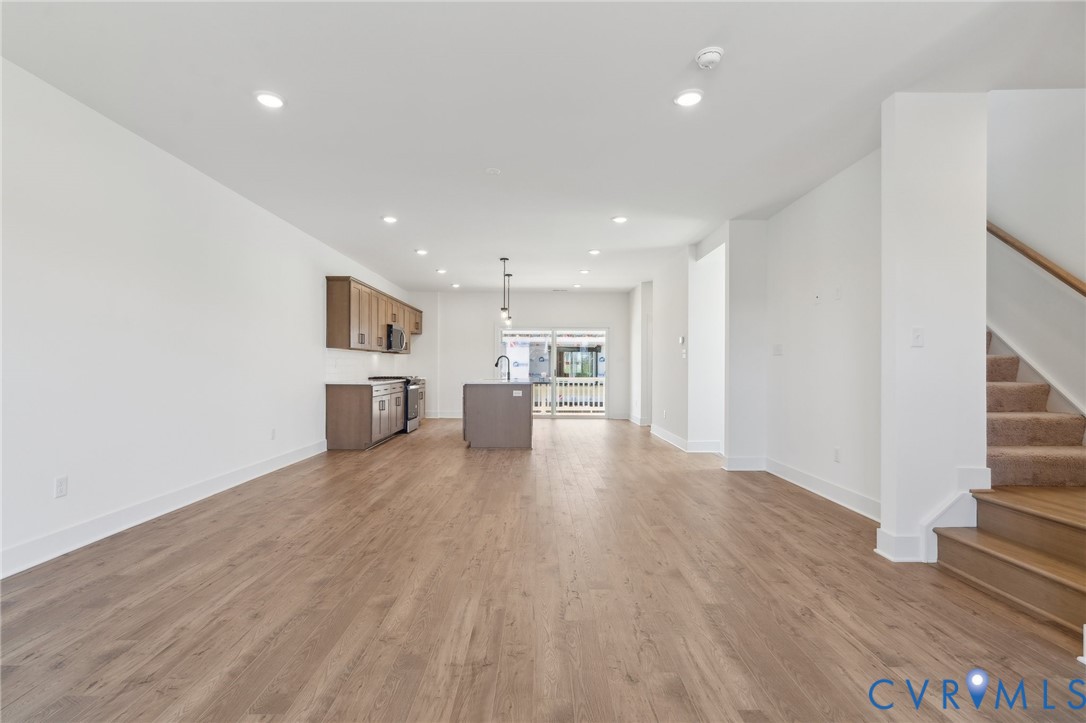 12014 Afternoon Path Henrico, VA 23233 - Photo 7 of 30 a view of a kitchen with wooden floor and a kitchen