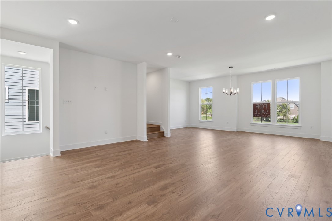 12014 Afternoon Path Henrico, VA 23233 - Photo 8 of 30 a view of an empty room with window and wooden floor