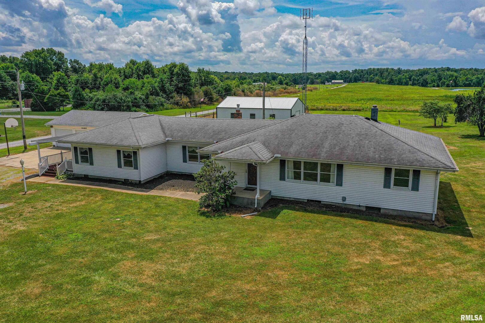 16485 East Robin Road Mount Vernon, IL 62864 - Photo 3 of 51 an aerial view of a house with swimming pool and a yard