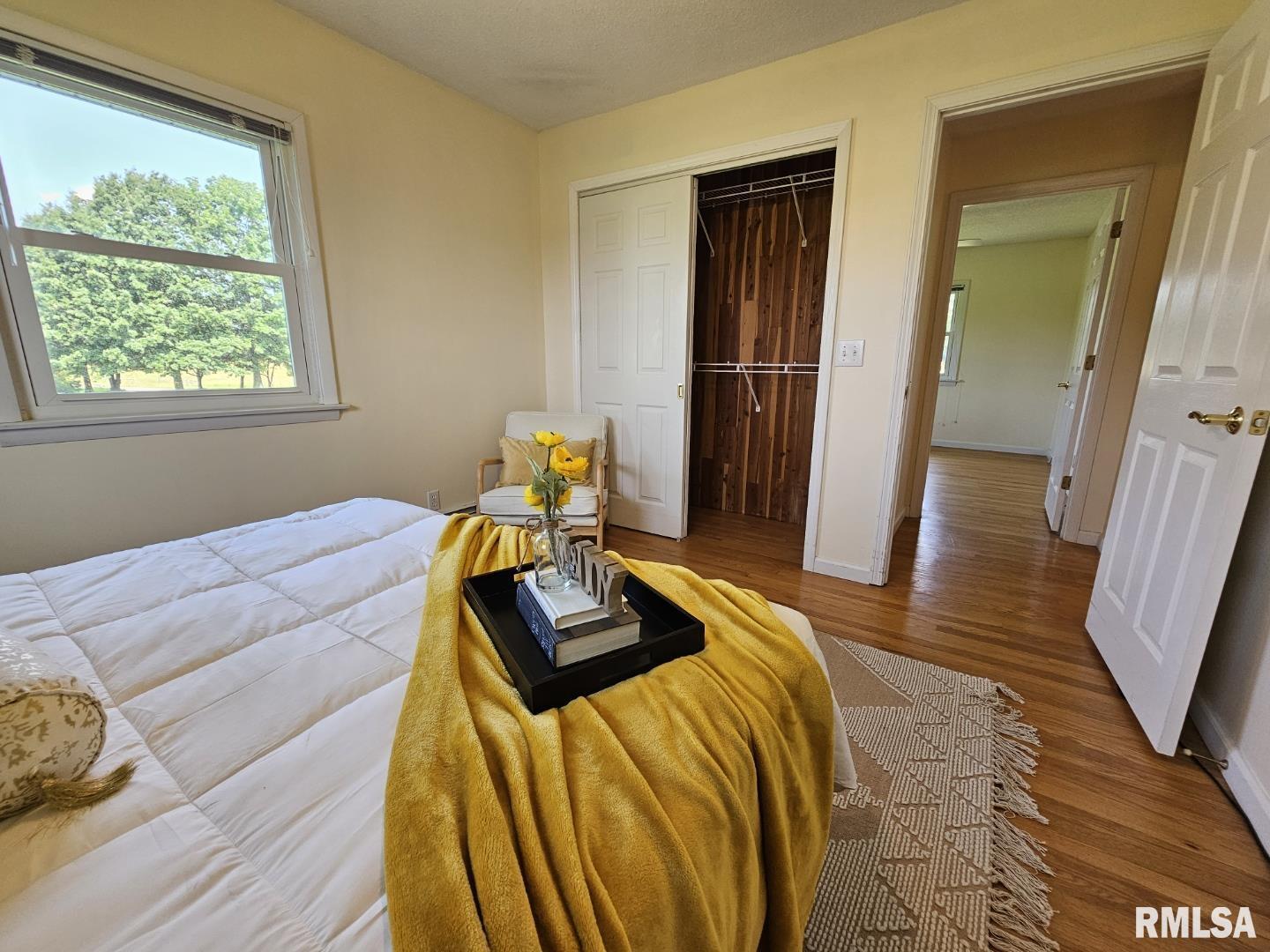 16485 East Robin Road Mount Vernon, IL 62864 - Photo 39 of 51 a bed sitting in a bedroom next to a window