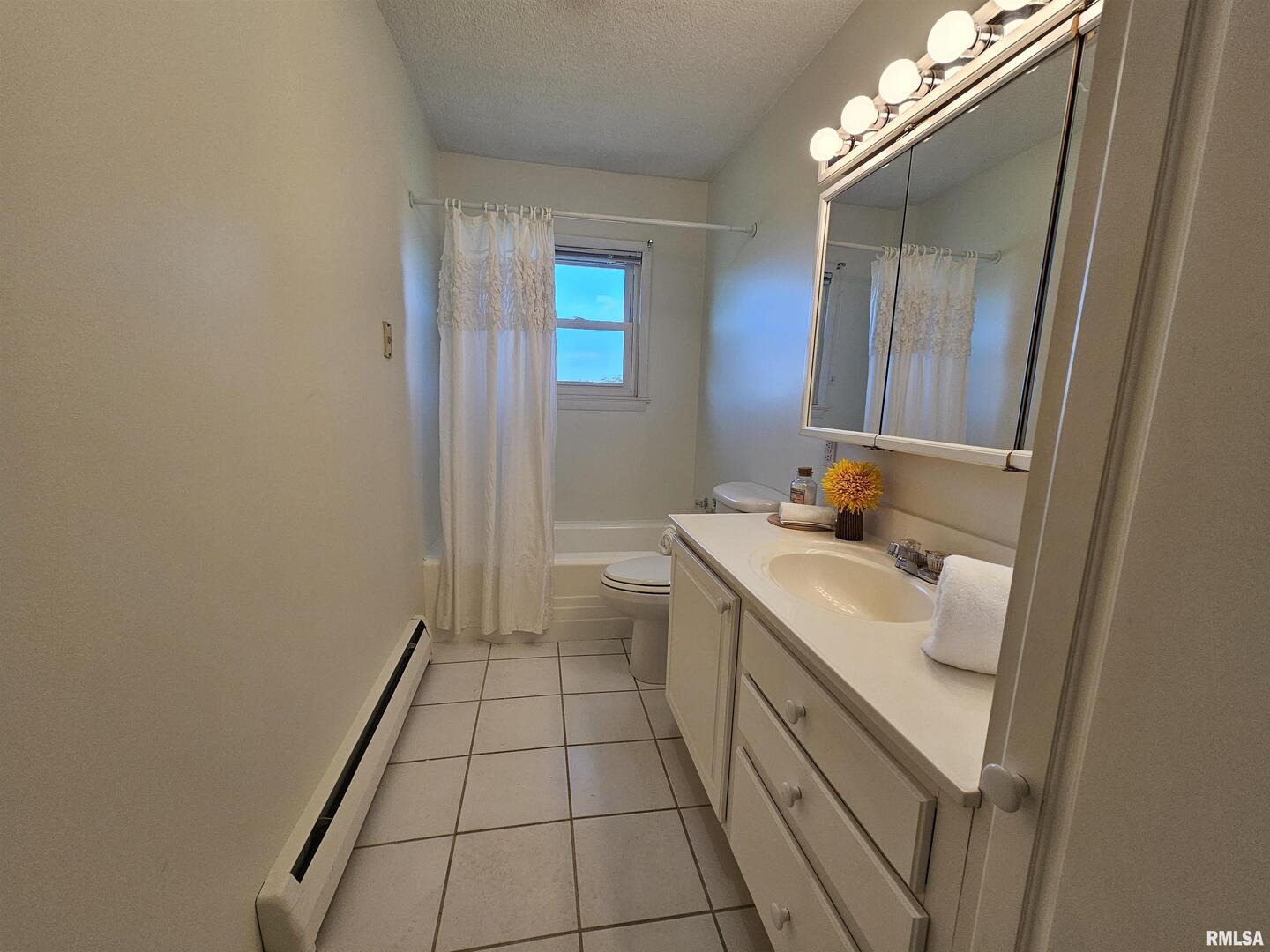 16485 East Robin Road Mount Vernon, IL 62864 - Photo 42 of 51 a bathroom with a sink a toilet and mirror