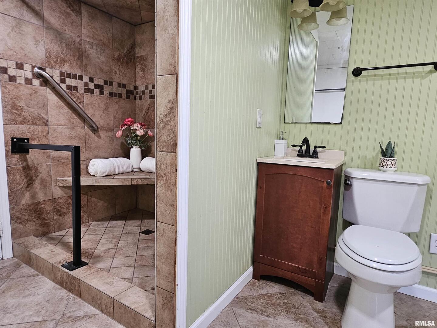 16485 East Robin Road Mount Vernon, IL 62864 - Photo 44 of 51 a bathroom with a toilet sink and mirror