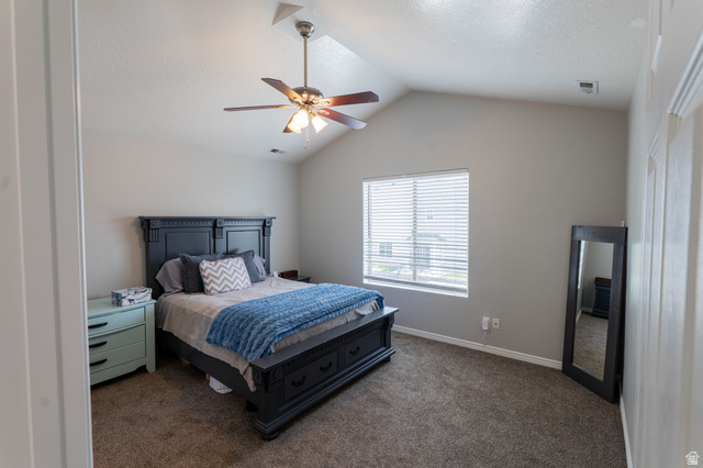 1443 West 250 North Springville, UT 84663 - Photo 14 of 23 Bedroom featuring a vaulted ceiling with a ceiling fan, a window with horizontal blinds, and carpeting