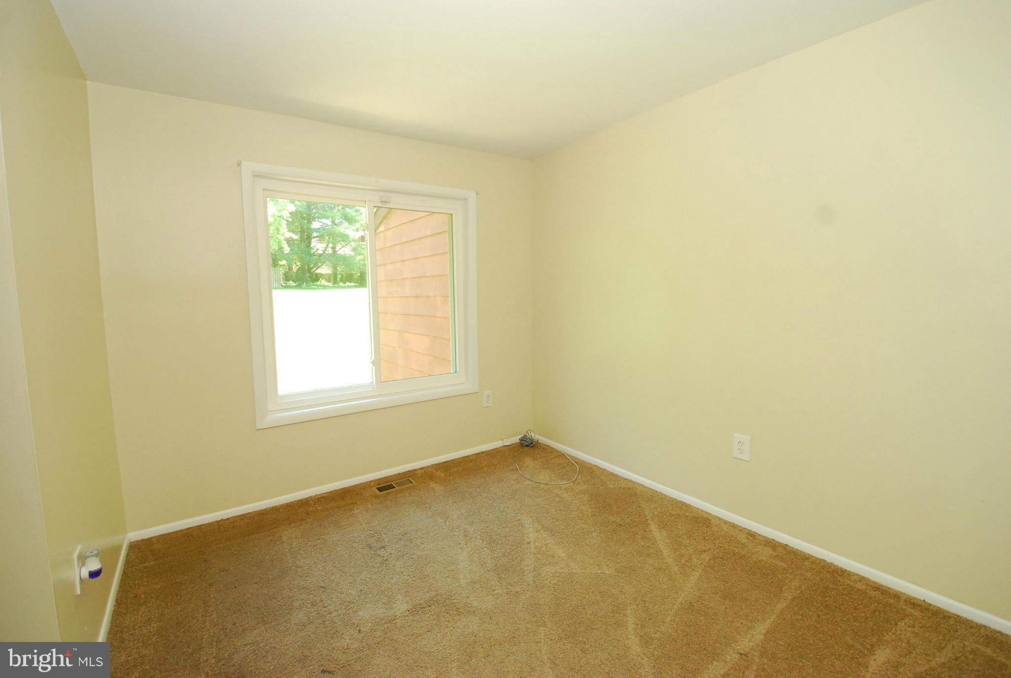 9134 Centerway Road Gaithersburg, MD 20879 - Photo 13 of 18 an empty room with a window