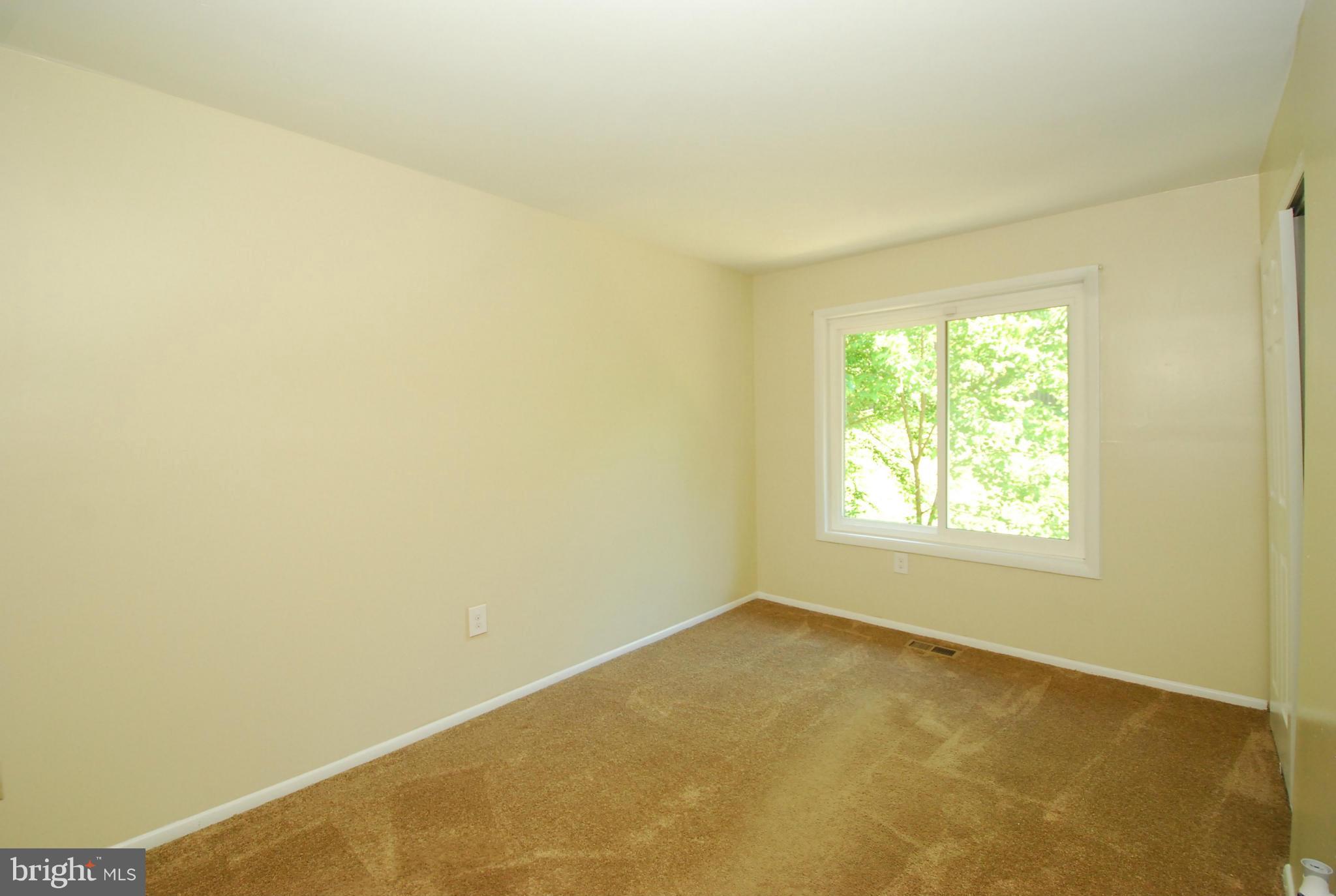 9134 Centerway Road Gaithersburg, MD 20879 - Photo 14 of 18 an empty room with a window