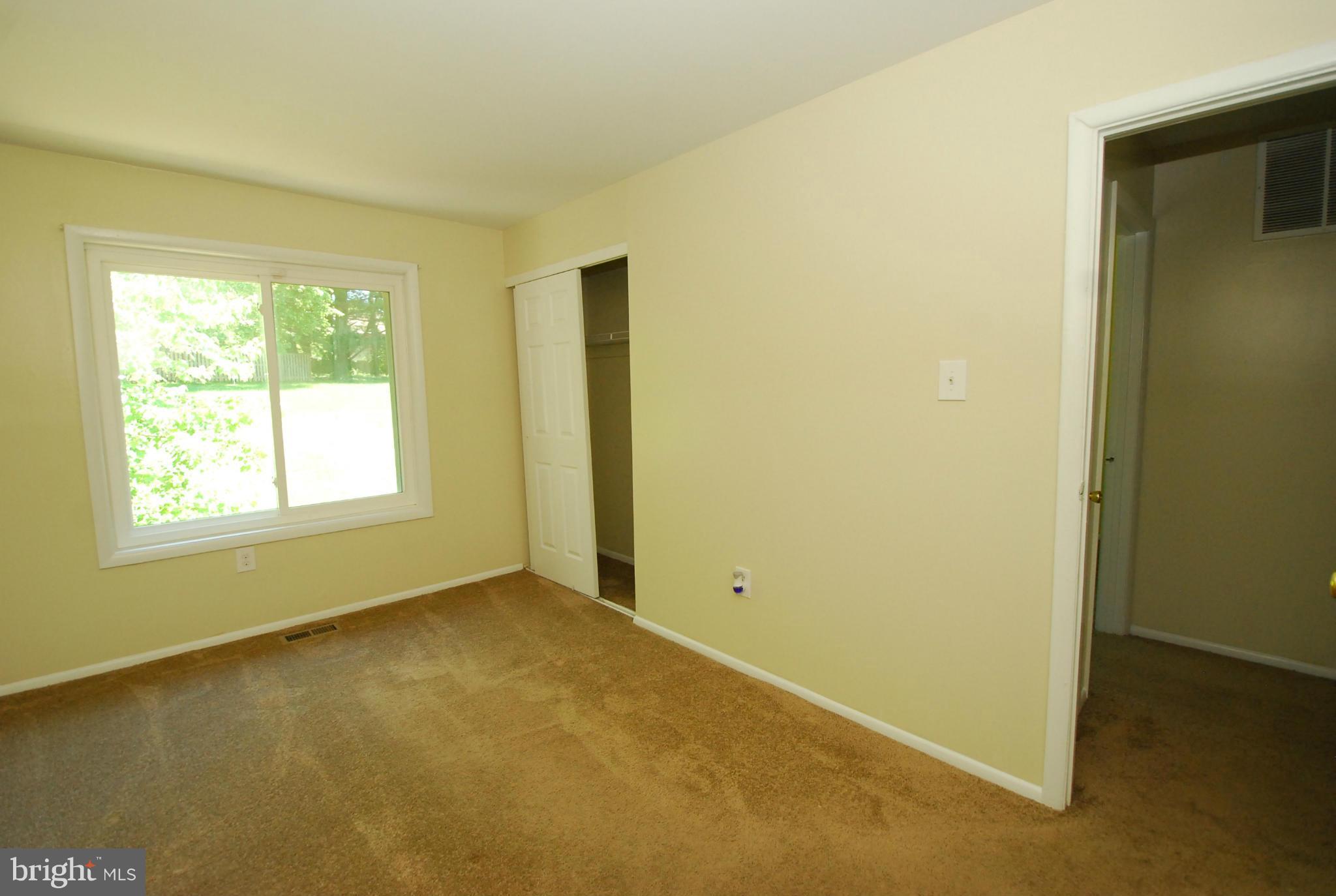 9134 Centerway Road Gaithersburg, MD 20879 - Photo 15 of 18 an empty room with a empty space and a window
