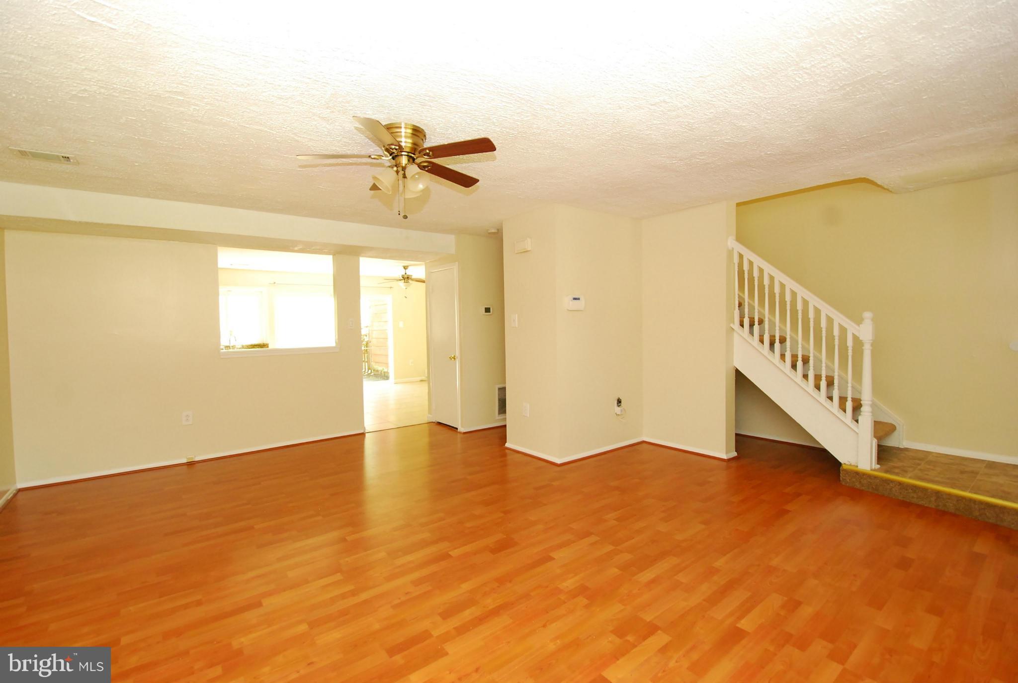 9134 Centerway Road Gaithersburg, MD 20879 - Photo 8 of 18 a view of an empty room with a window