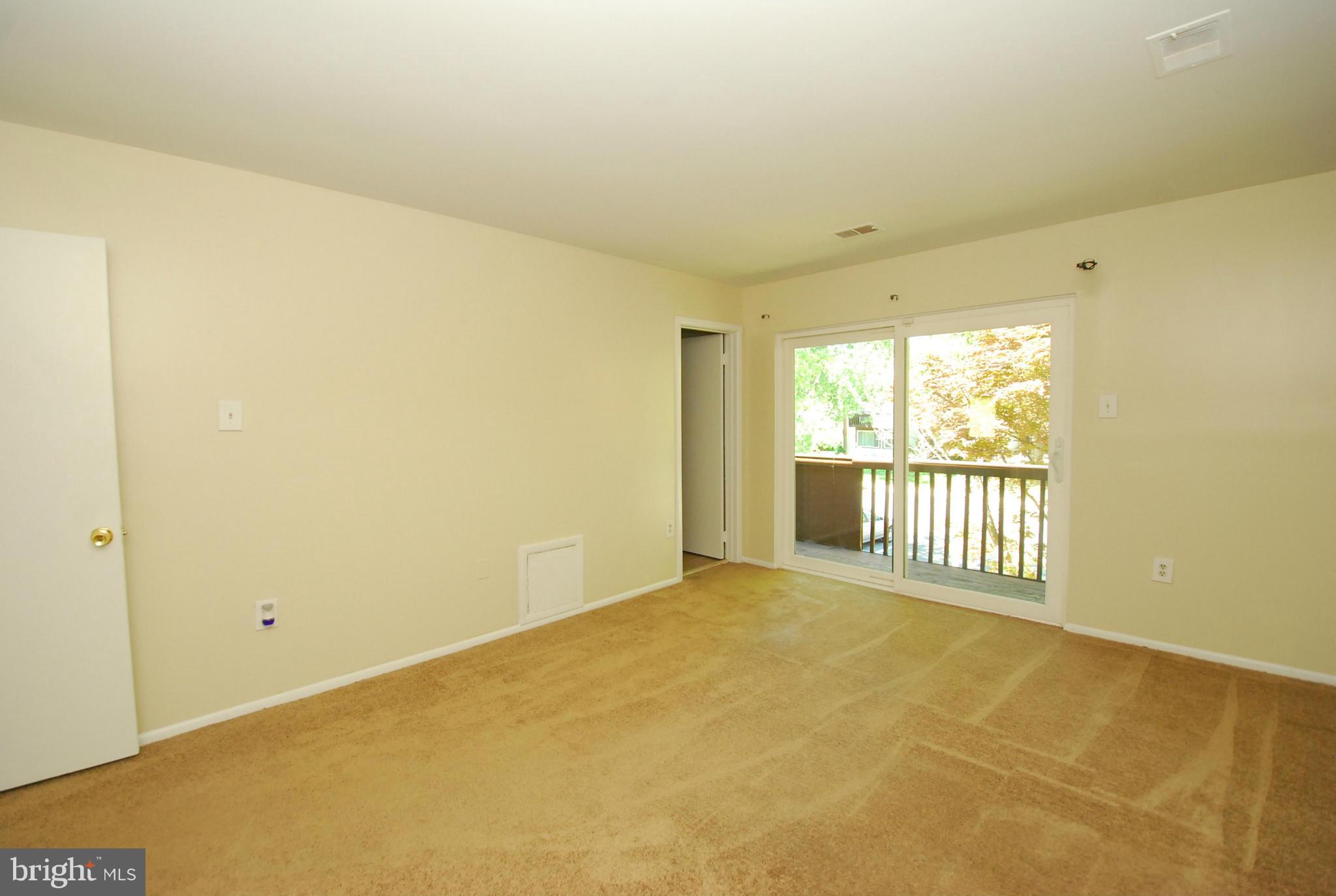 9134 Centerway Road Gaithersburg, MD 20879 - Photo 10 of 18 a view of an empty room with a window