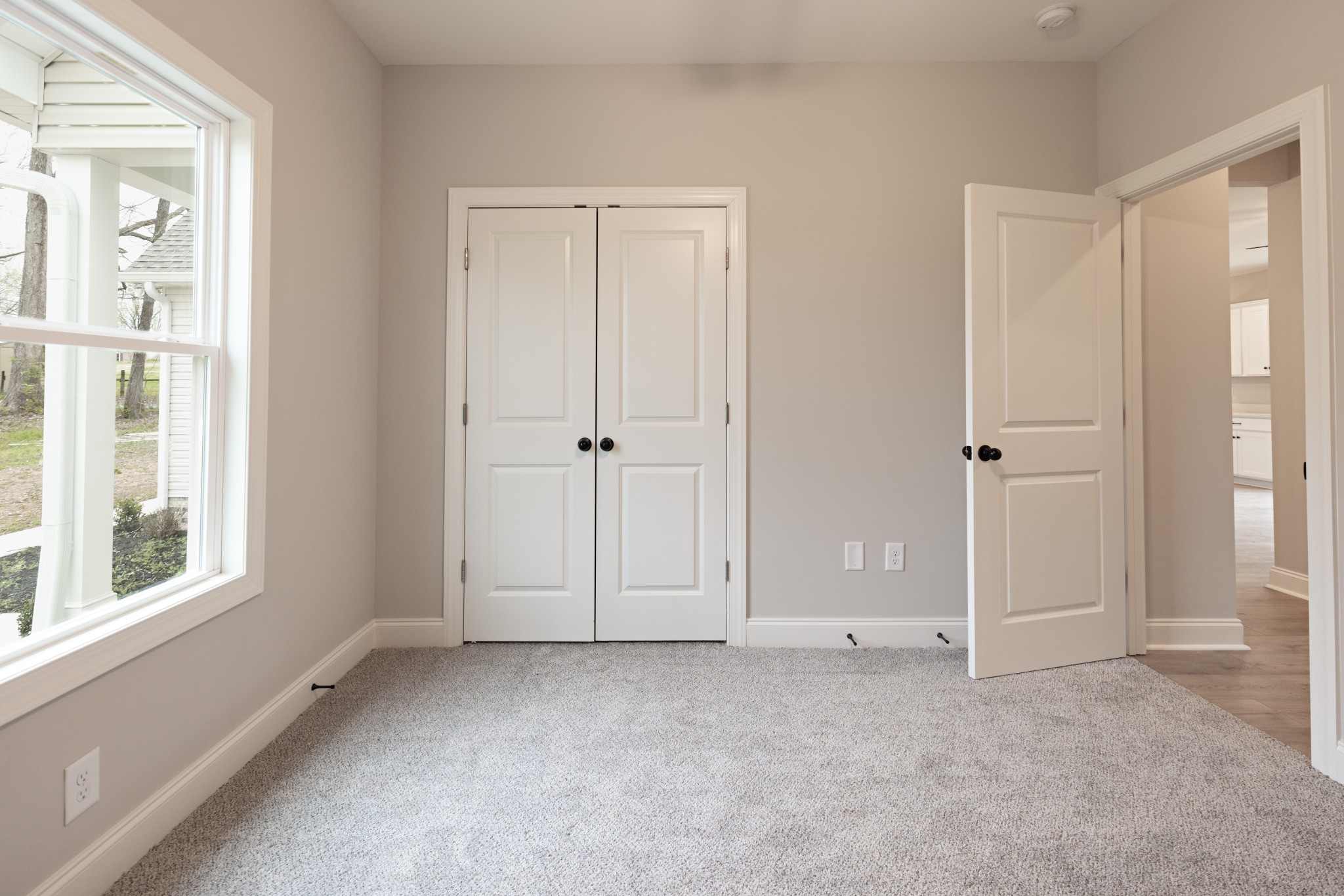 340 Woodruff Road Adams, TN 37010 - Photo 7 of 15 a view of an empty room with a window