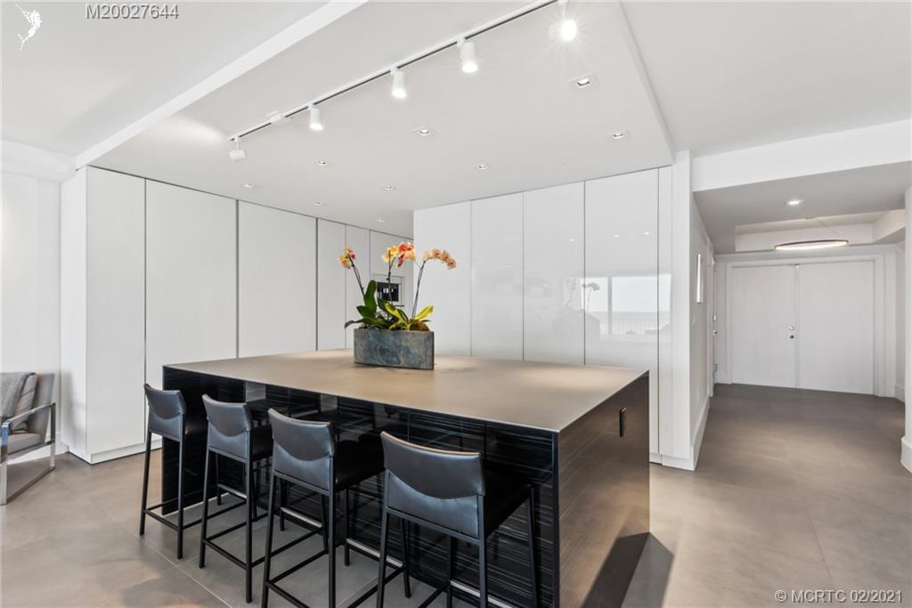 2001 Southeast Sailfish Point Boulevard, Unit 412 Stuart, FL 34996 - Photo 11 of 54 a view of a dining room with furniture