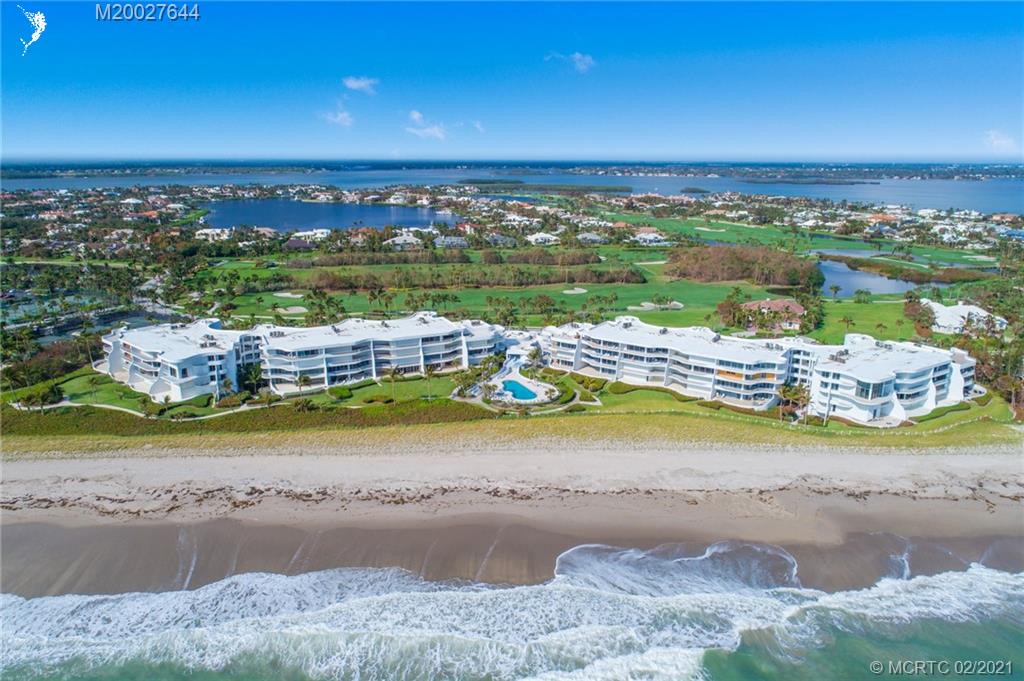 2001 Southeast Sailfish Point Boulevard, Unit 412 Stuart, FL 34996 - Photo 25 of 54 a view of a swimming pool and an ocean