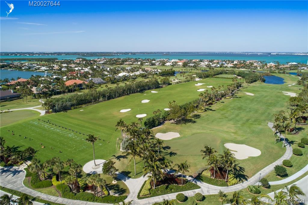 2001 Southeast Sailfish Point Boulevard, Unit 412 Stuart, FL 34996 - Photo 32 of 54 a view of a lake with a city