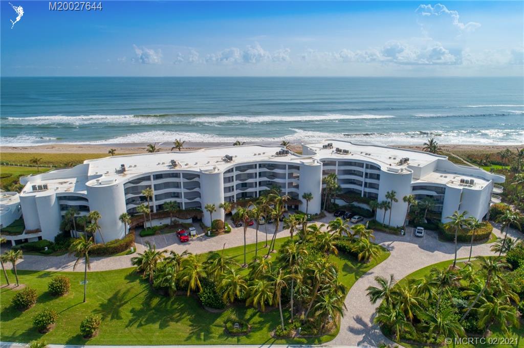 2001 Southeast Sailfish Point Boulevard, Unit 412 Stuart, FL 34996 - Photo 5 of 54 a view of a water with lawn chairs