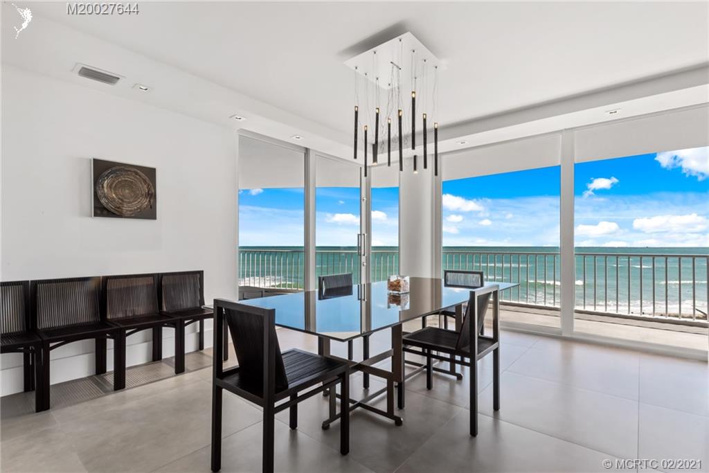 2001 Southeast Sailfish Point Boulevard, Unit 412 Stuart, FL 34996 - Photo 8 of 54 a view of a dining room with furniture window and outside view