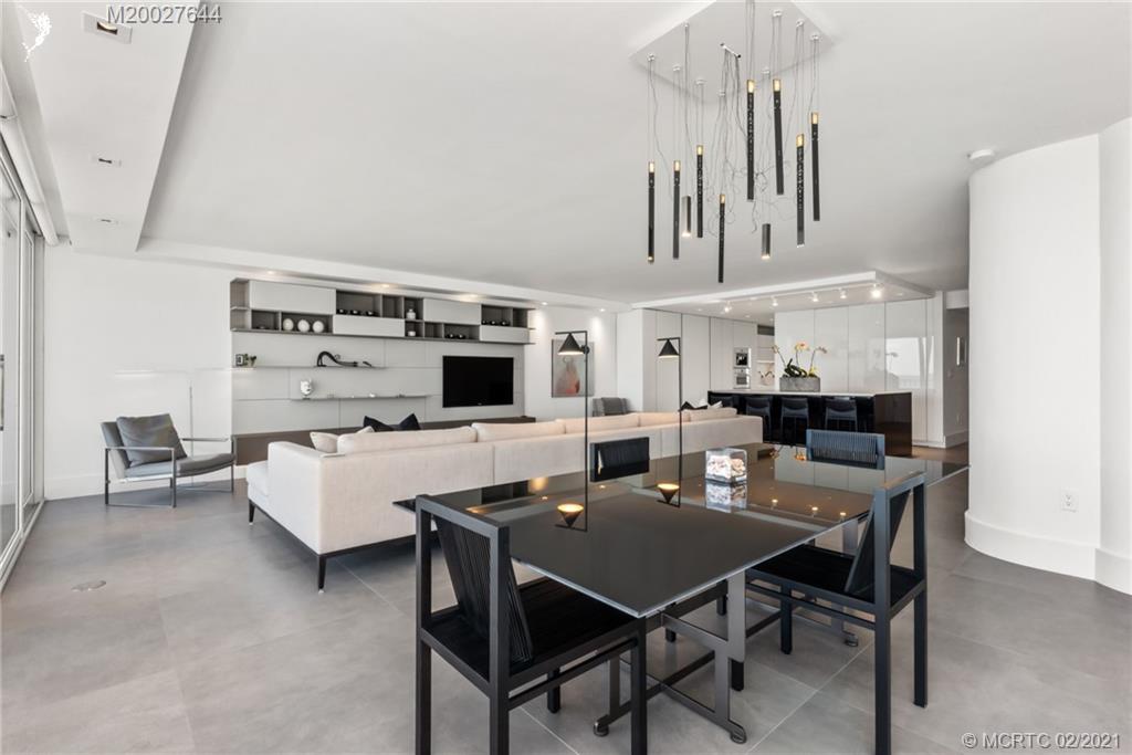 2001 Southeast Sailfish Point Boulevard, Unit 412 Stuart, FL 34996 - Photo 9 of 54 a view of a dining room with furniture