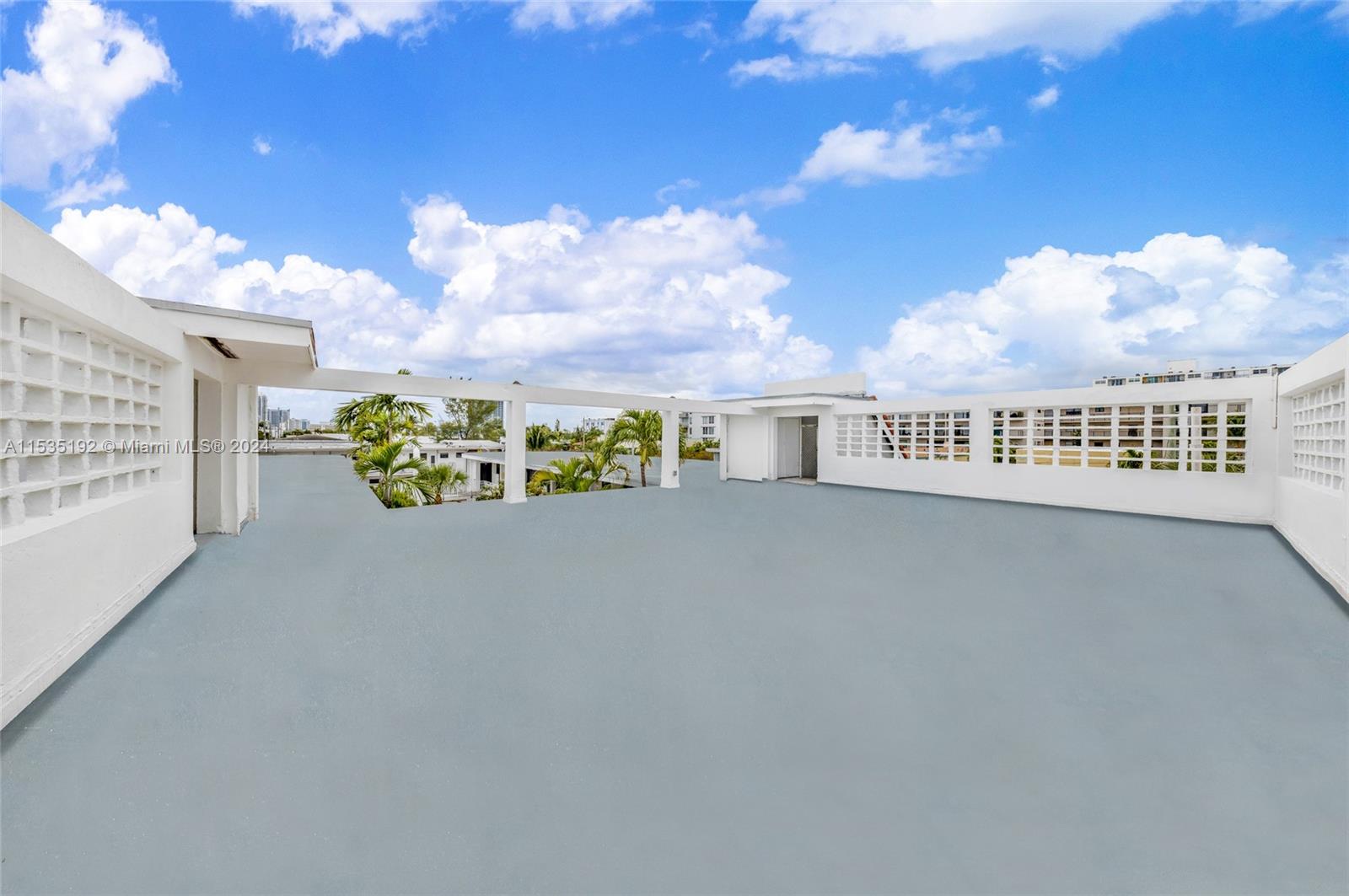235 78th Street Miami Beach, FL 33141 - Photo 11 of 36 a view of a street with a building in the background