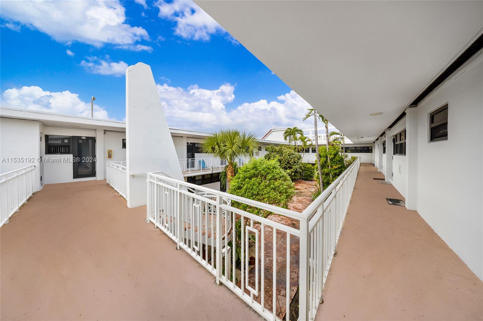 235 78th Street Miami Beach, FL 33141 - Photo 8 of 36 a view of a porch