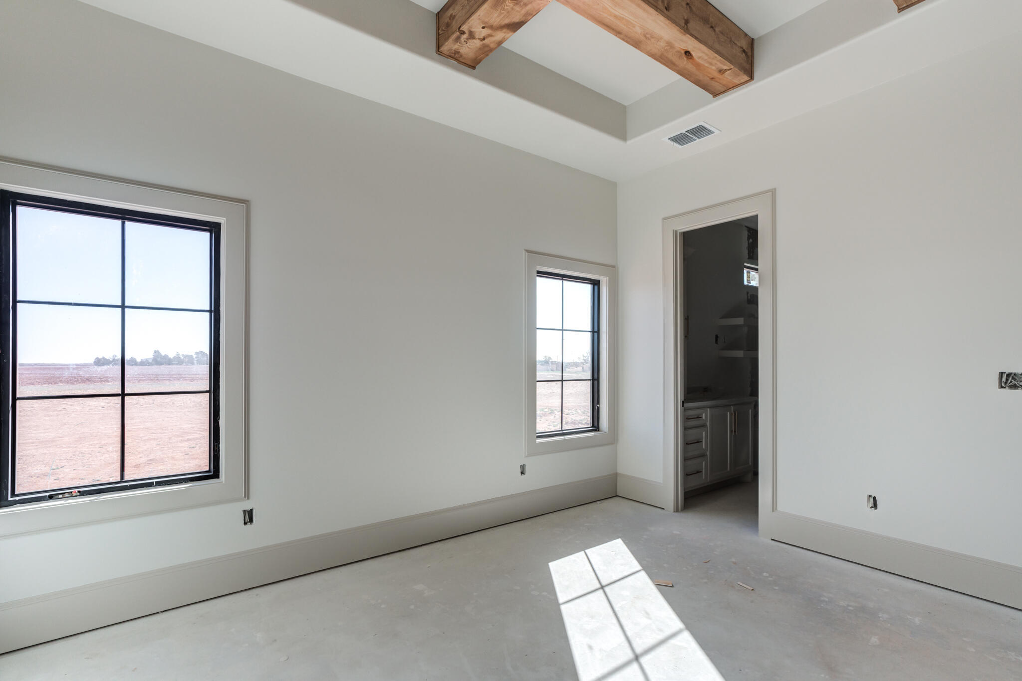 6309 Foster Road Ropesville, TX 79358 - Photo 31 of 38 an empty room with windows