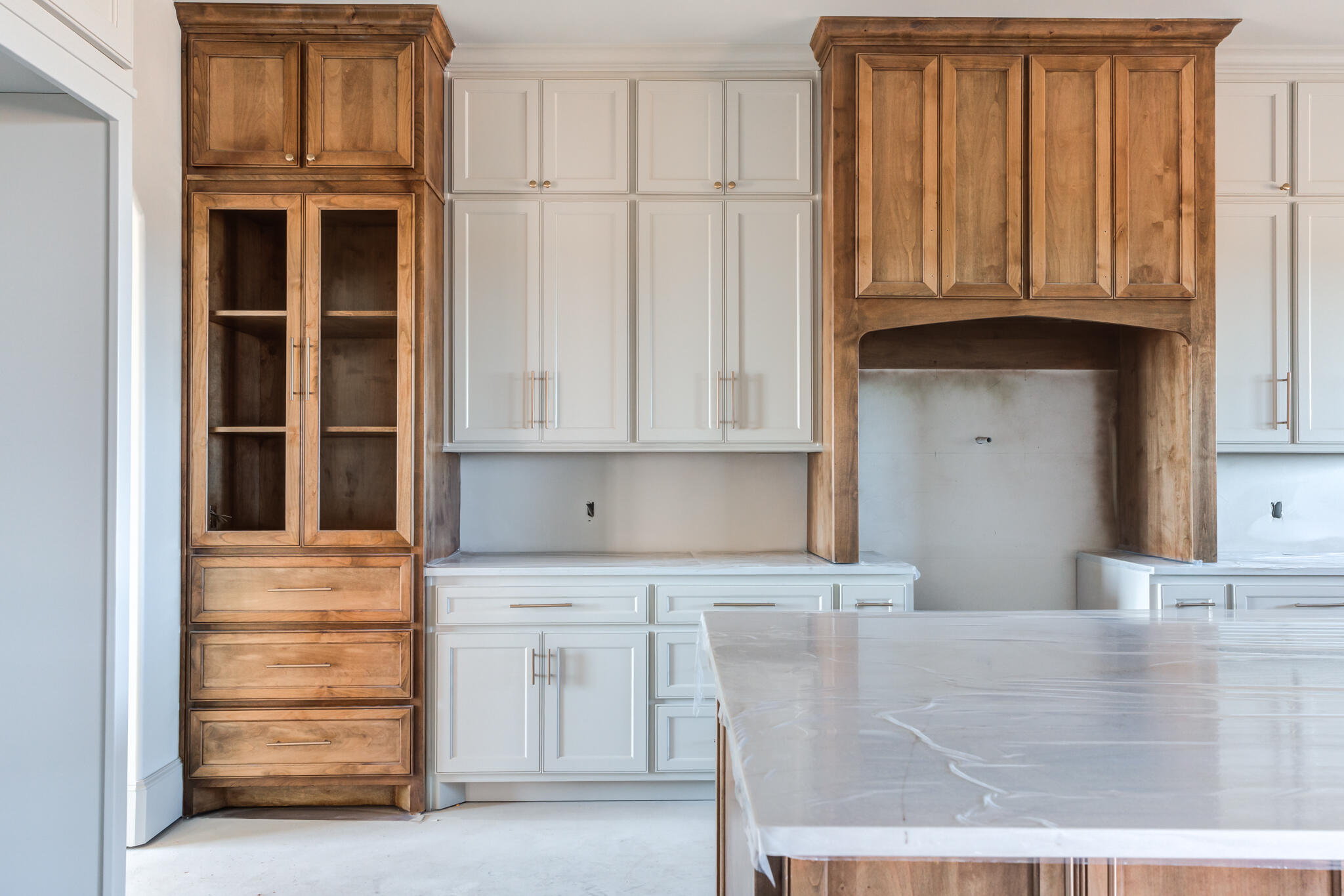 6309 Foster Road Ropesville, TX 79358 - Photo 5 of 38 a kitchen with granite countertop white cabinets and stainless steel appliances