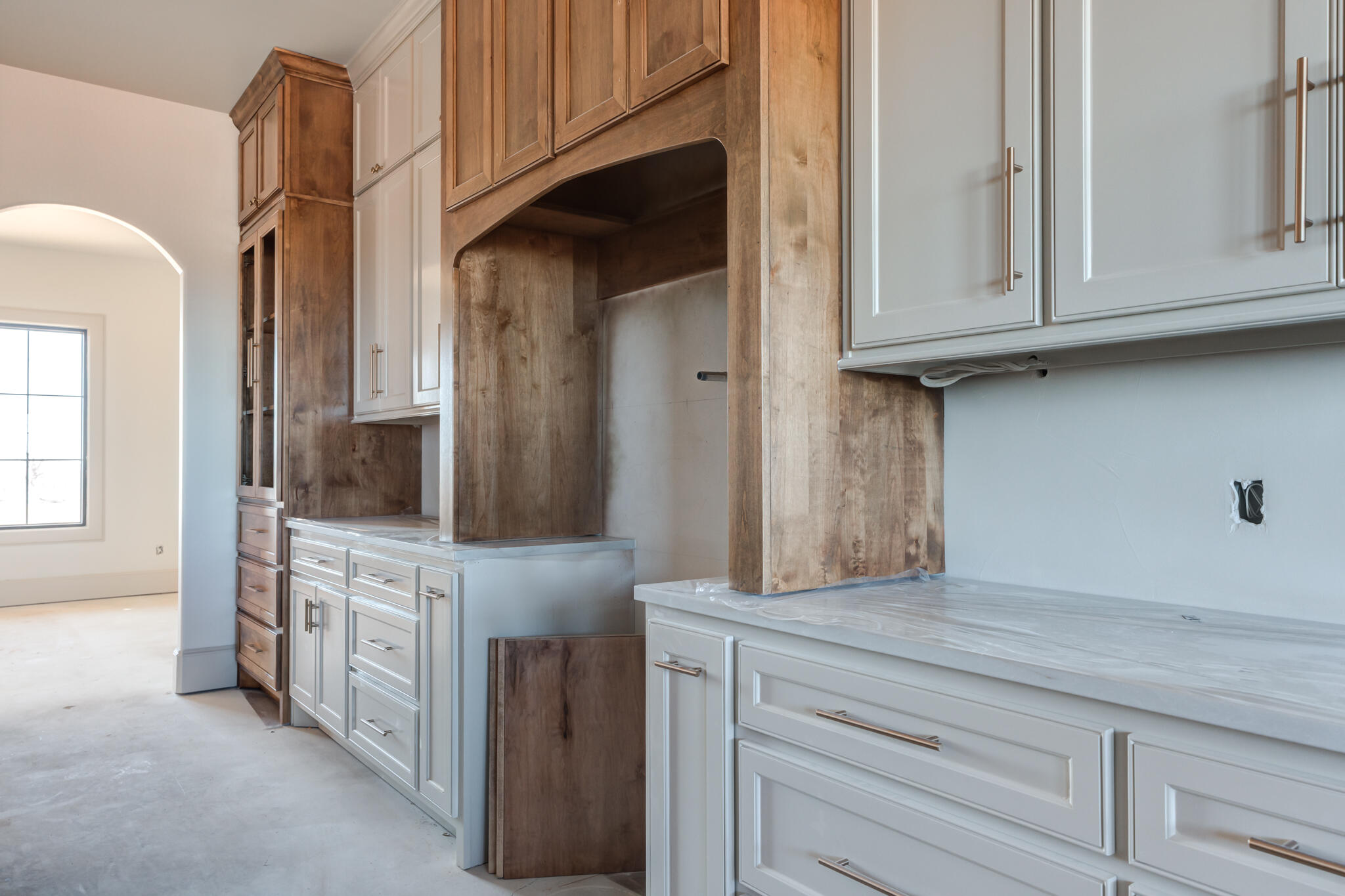 6309 Foster Road Ropesville, TX 79358 - Photo 9 of 38 a kitchen with stainless steel appliances granite countertop white cabinets and a refrigerator