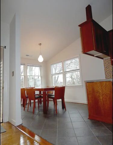 a view of a livingroom with furniture and wooden floor