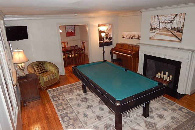 a room with furniture and a fireplace