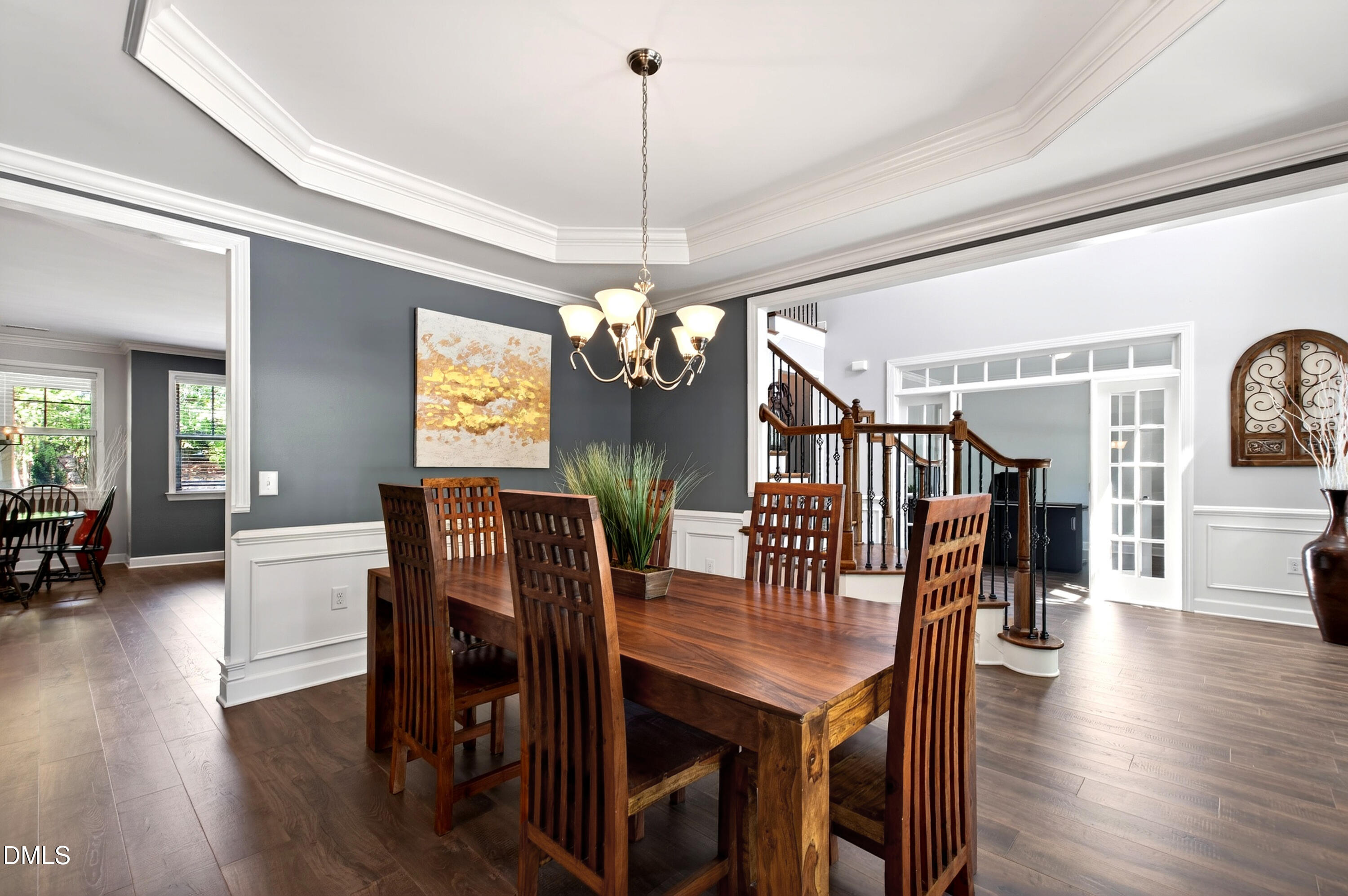 313 Karpen Lane Cary, NC 27519 - Photo 17 of 86 a view of a dining room with furniture window and wooden floor