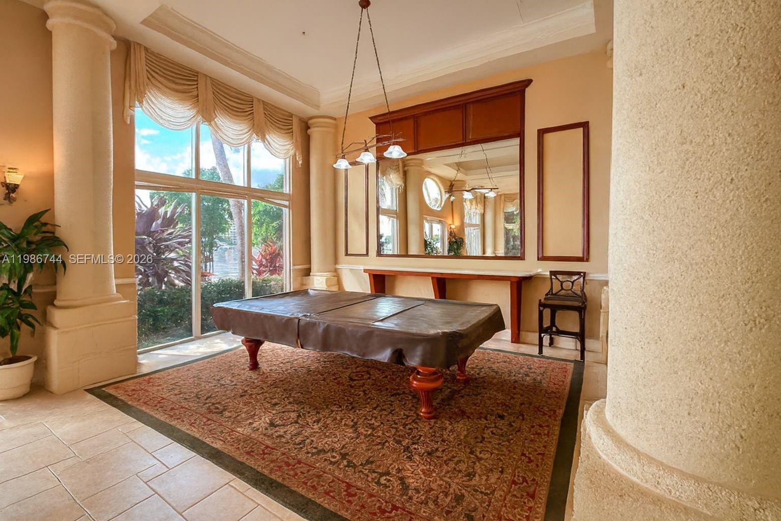 17150 North Bay Road, Unit 2122 Sunny Isles Beach, FL 33160 - Photo 15 of 19 a living room with furniture and a window