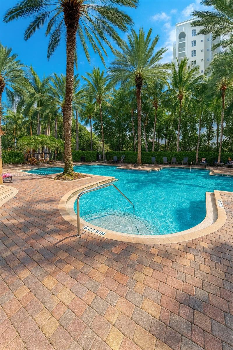 17150 North Bay Road, Unit 2122 Sunny Isles Beach, FL 33160 - Photo 17 of 19 a view of a backyard