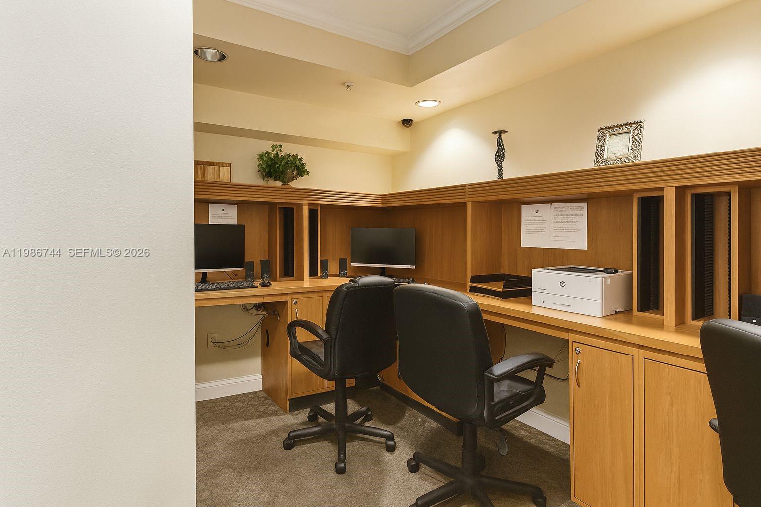 17150 North Bay Road, Unit 2122 Sunny Isles Beach, FL 33160 - Photo 18 of 19 a view of a workspace with furniture and a window