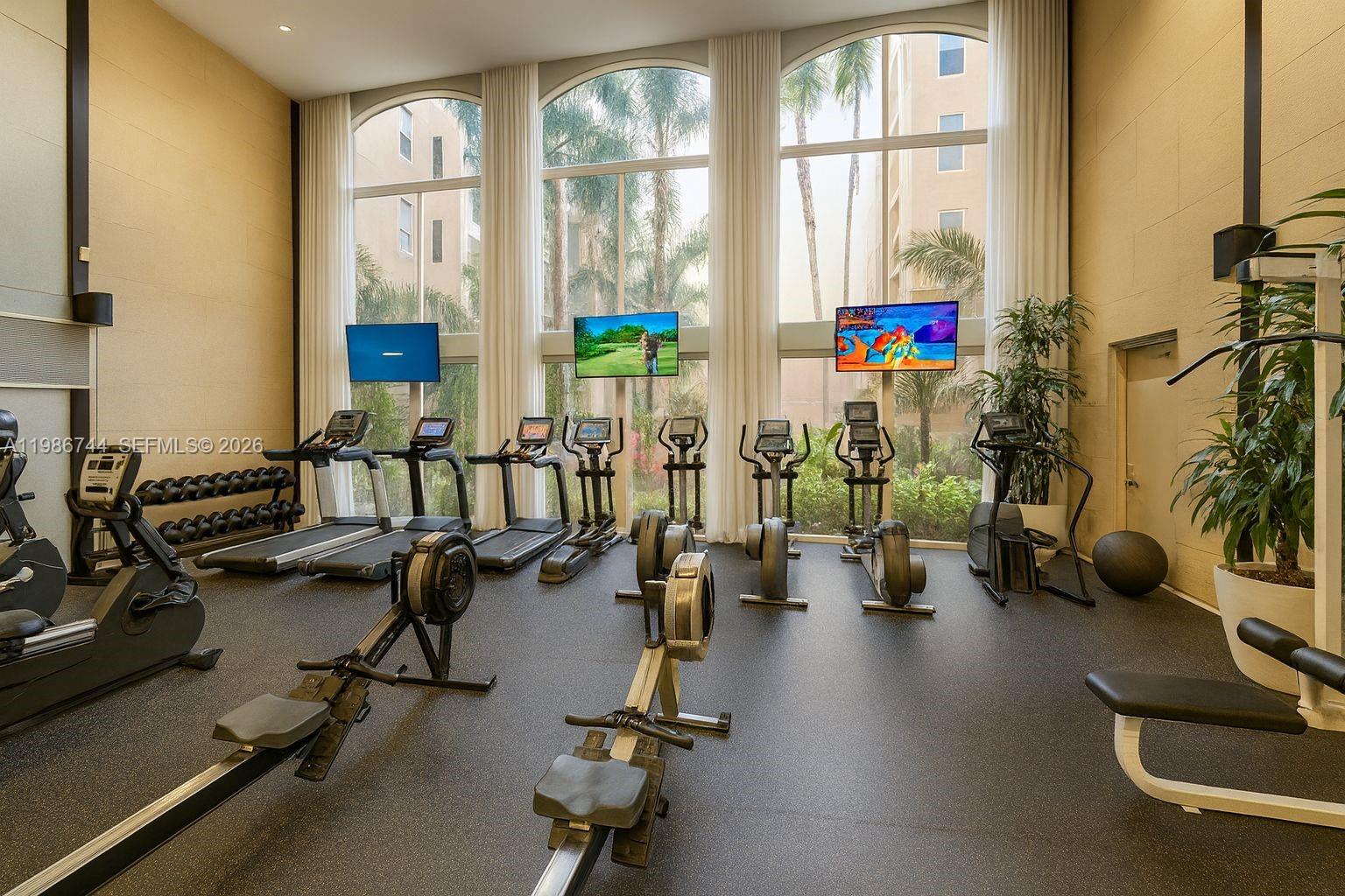 17150 North Bay Road, Unit 2122 Sunny Isles Beach, FL 33160 - Photo 19 of 19 a view of a room with gym equipment