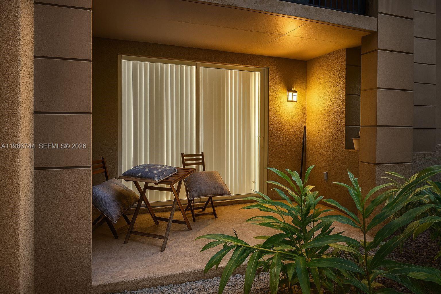 17150 North Bay Road, Unit 2122 Sunny Isles Beach, FL 33160 - Photo 2 of 19 a view of a balcony with furniture and rug