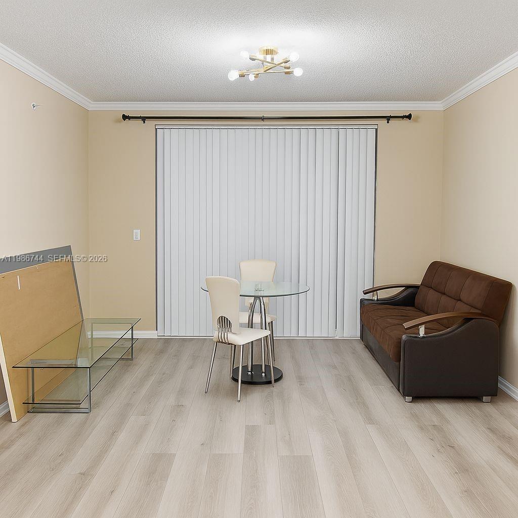 17150 North Bay Road, Unit 2122 Sunny Isles Beach, FL 33160 - Photo 4 of 19 a living room with furniture