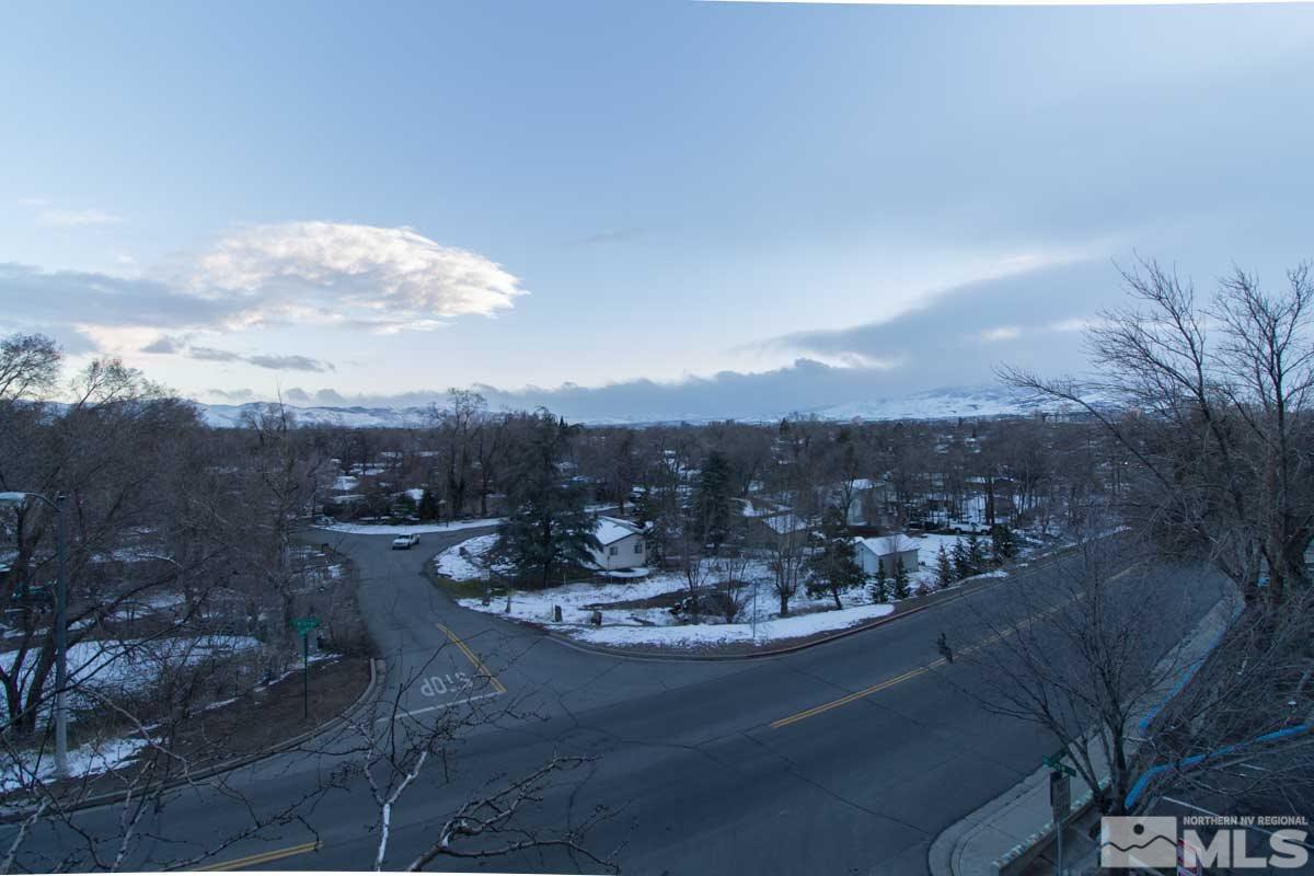 2530 Tripp Drive, Unit 3 Reno, NV 89512 - Photo 1 of 1 a view of a lake in middle of forest