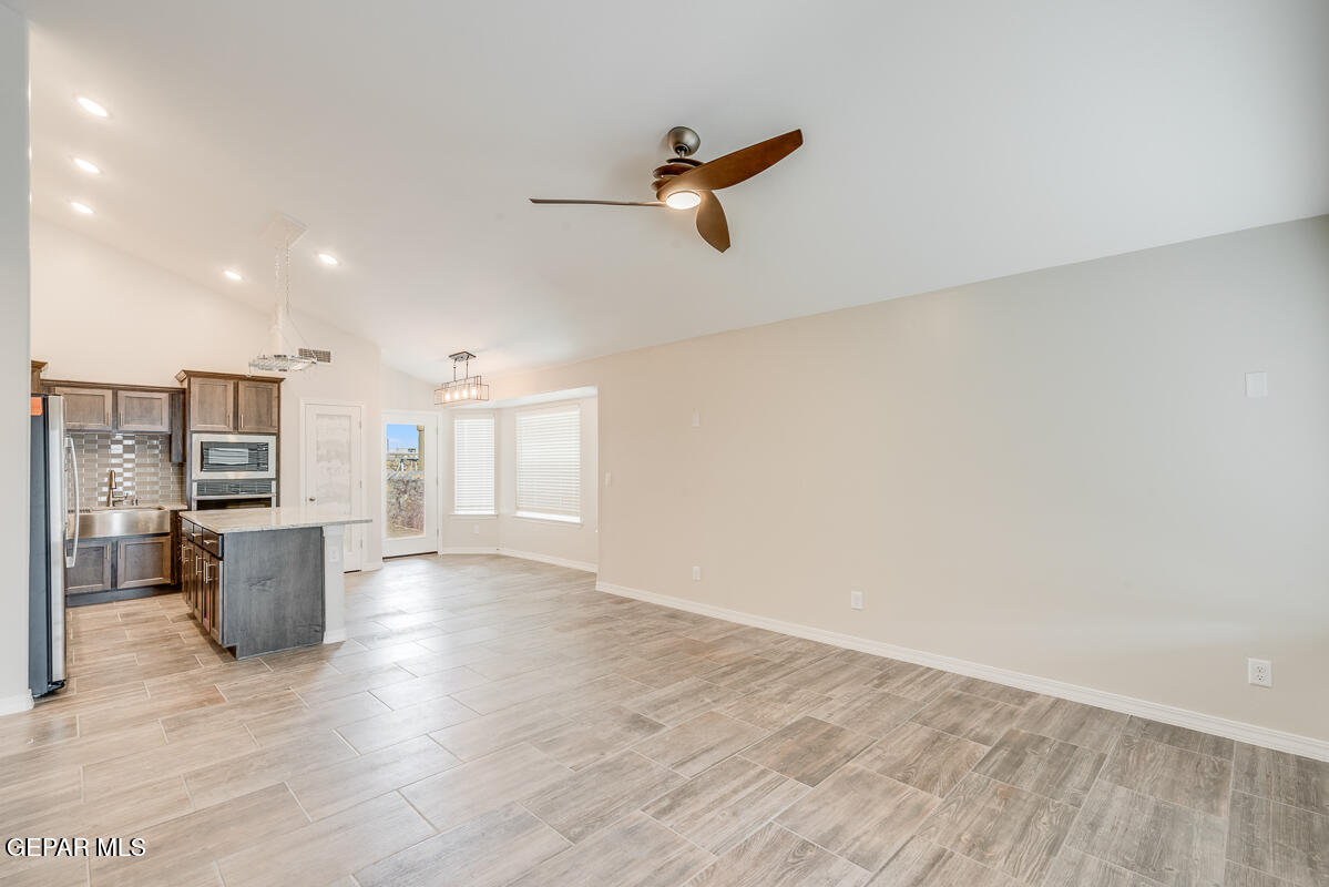 6042 Summer Ridge Santa Teresa, NM 88008 - Photo 2 of 25 a view of a kitchen with a sink and a window