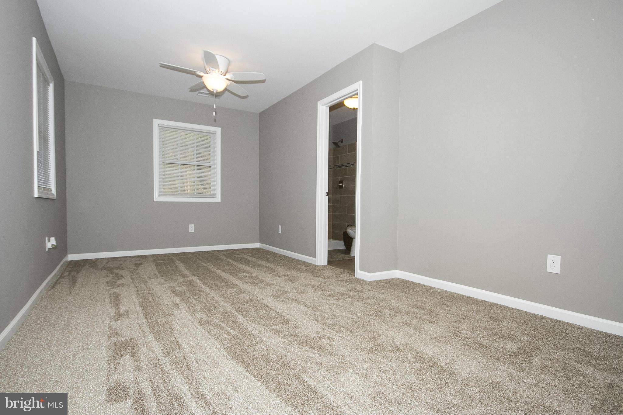 700 Middle River Road Baltimore, MD 21220 - Photo 12 of 29 a view of an empty room with a window