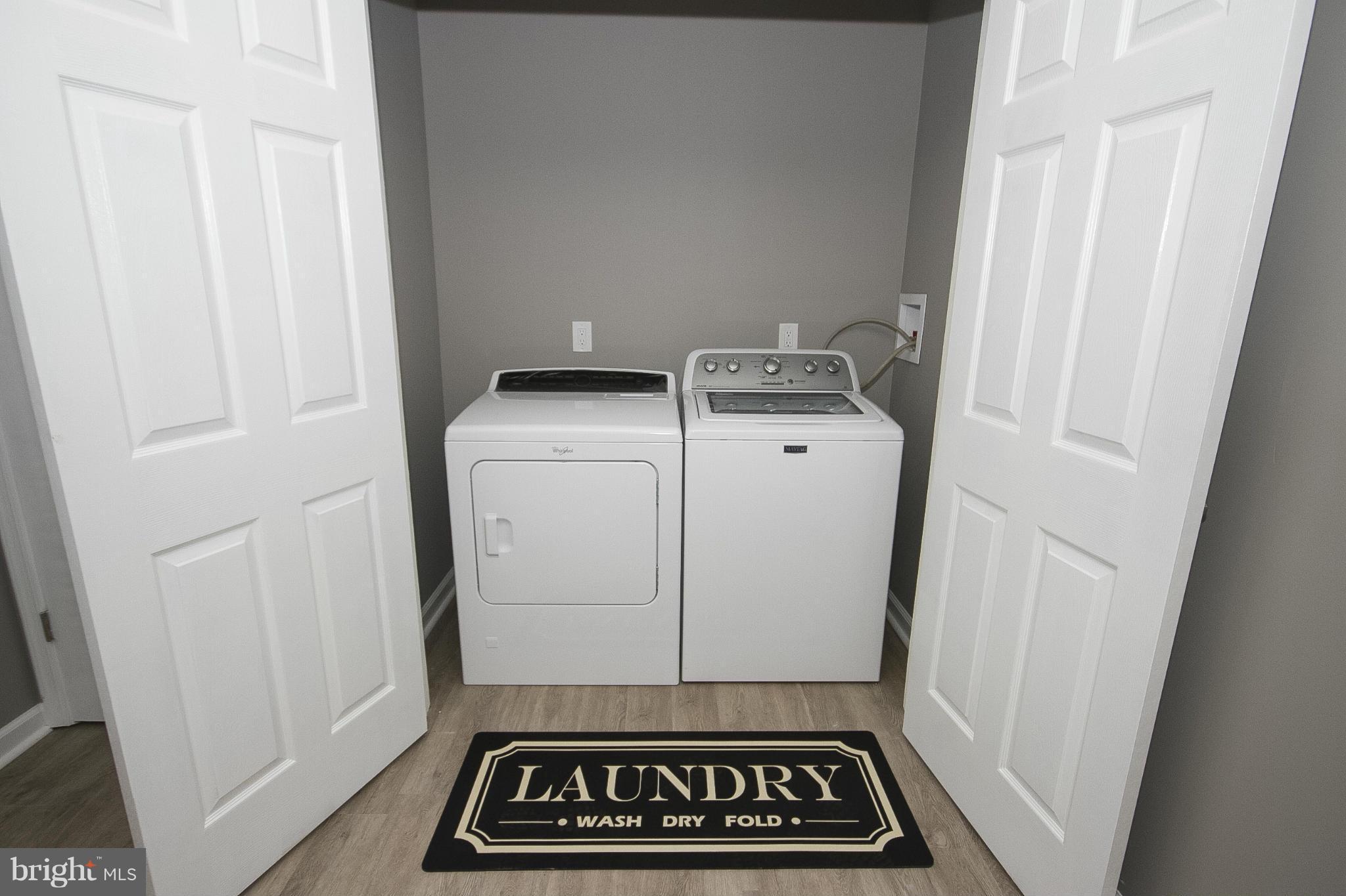 700 Middle River Road Baltimore, MD 21220 - Photo 21 of 29 a utility room with dryer and washer