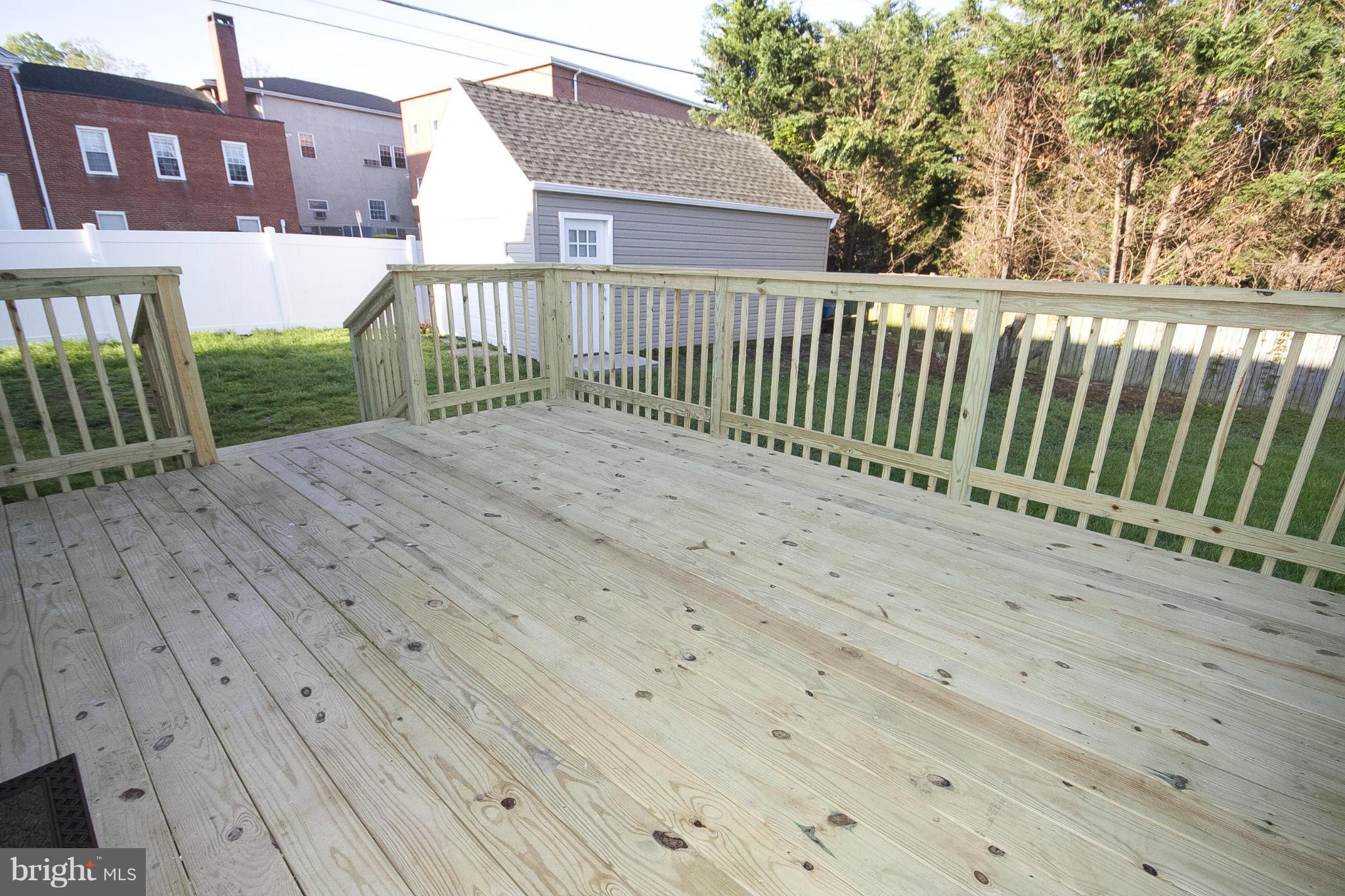 700 Middle River Road Baltimore, MD 21220 - Photo 26 of 29 a view of a wooden deck