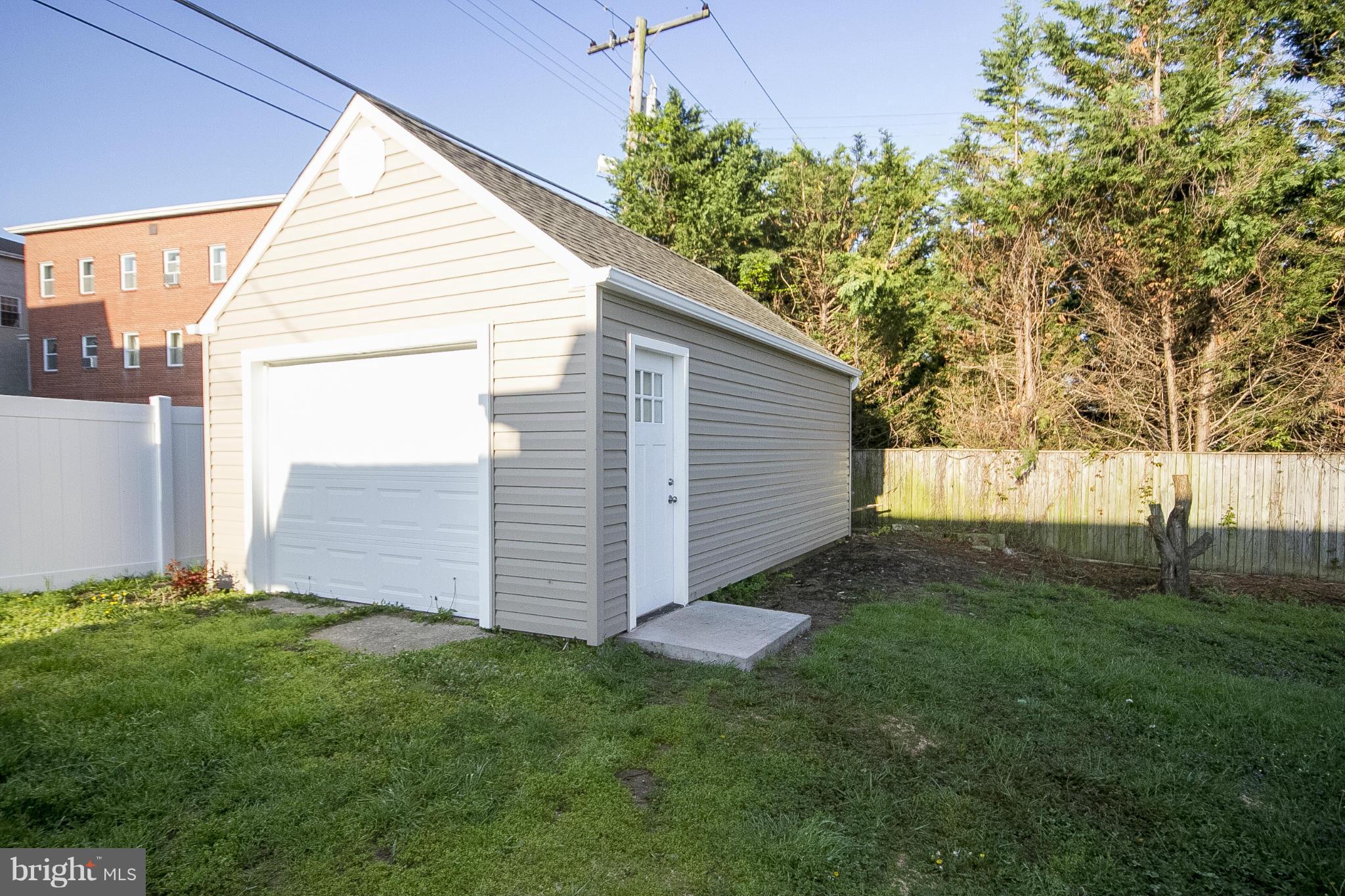 700 Middle River Road Baltimore, MD 21220 - Photo 29 of 29 a view of a back yard of the house
