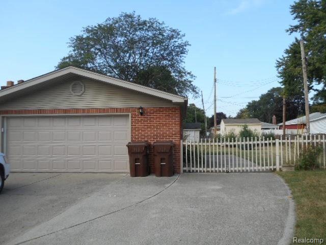 36790 Greenbush Road Wayne, MI 48184 - Photo 51 of 56 2 car wide & 2 car deep driveway plus! lane for parking your Rv, camper, or boat.