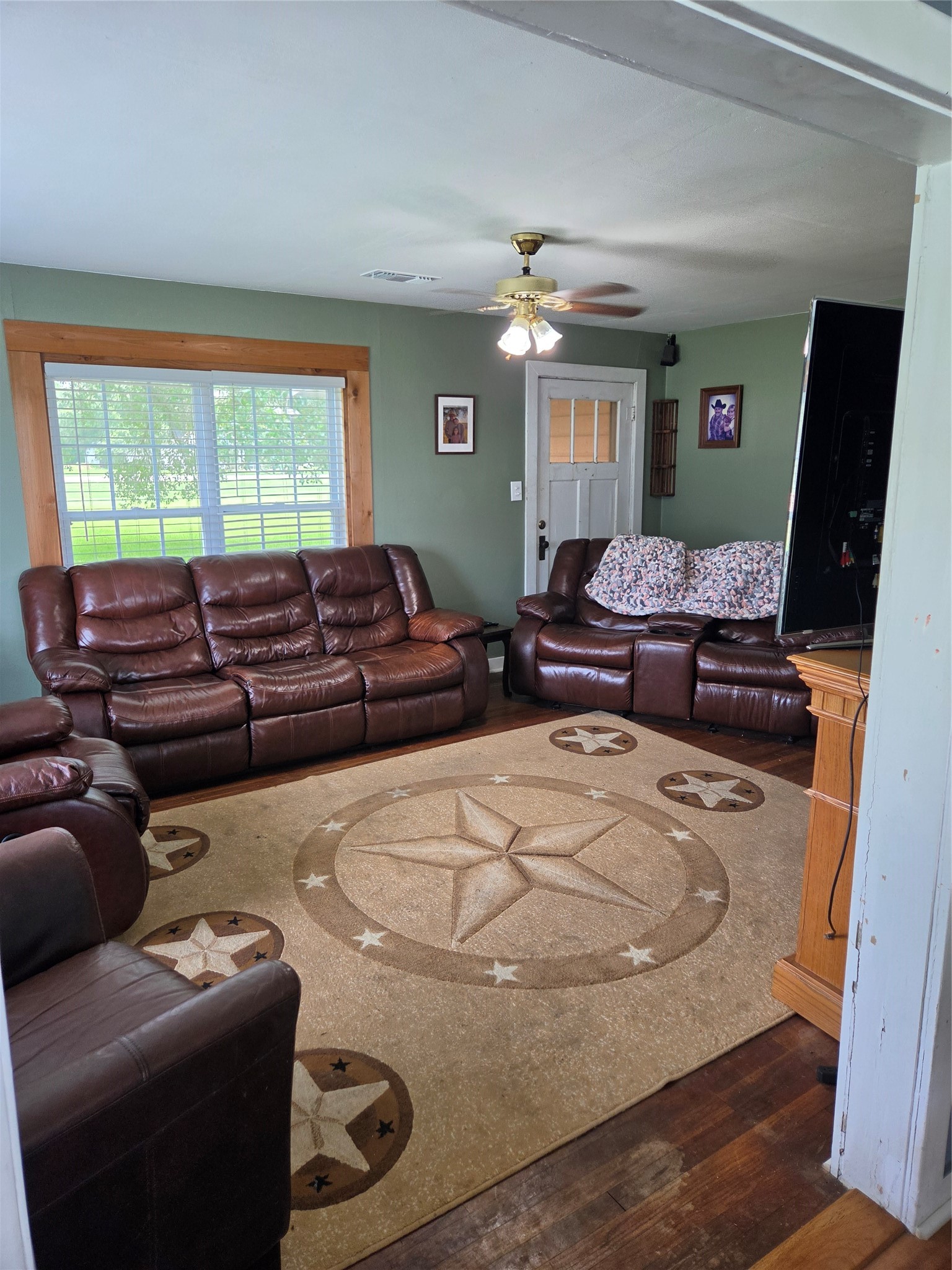 4910 FM 3012 Road Wharton, TX 77488 - Photo 21 of 21 Spacious living room featuring an open floor plan, abundant natural light, and elegant finishes throughout.