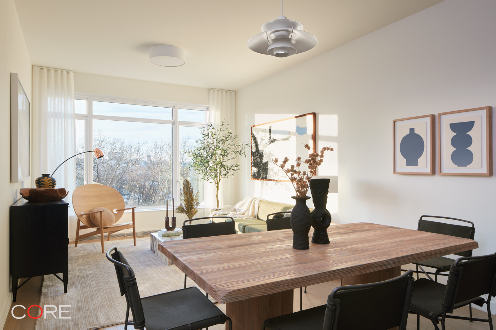 555 West 22nd Street, Unit 10BE Manhattan, NY 10011 - Photo 2 of 11 a dining room with furniture and wooden floor