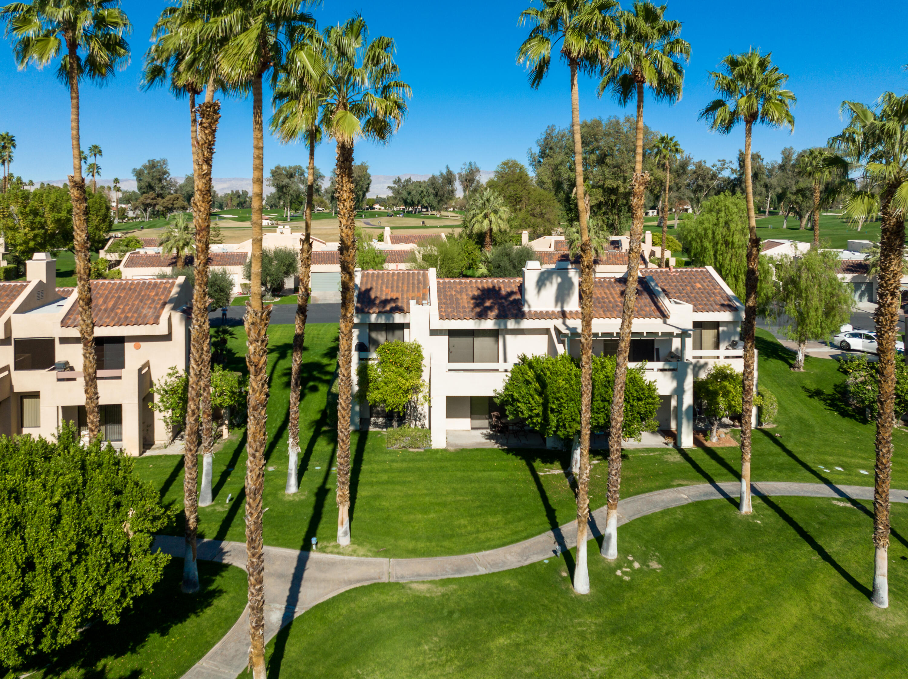 11 Mission Court Rancho Mirage, CA 92270 - Photo 22 of 59 a view of multiple houses with yard
