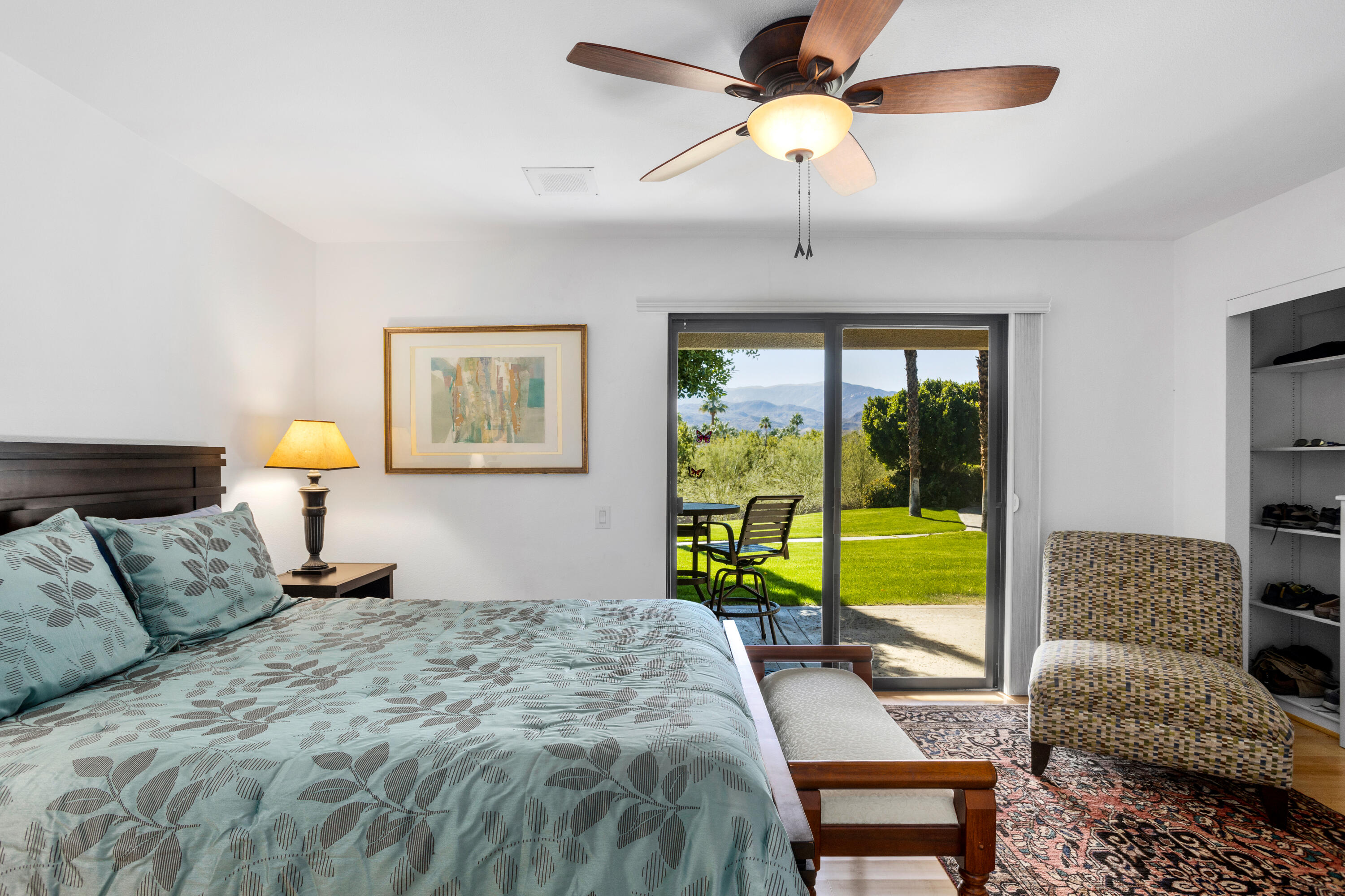 11 Mission Court Rancho Mirage, CA 92270 - Photo 29 of 59 a bedroom with a bed and a view of balcony